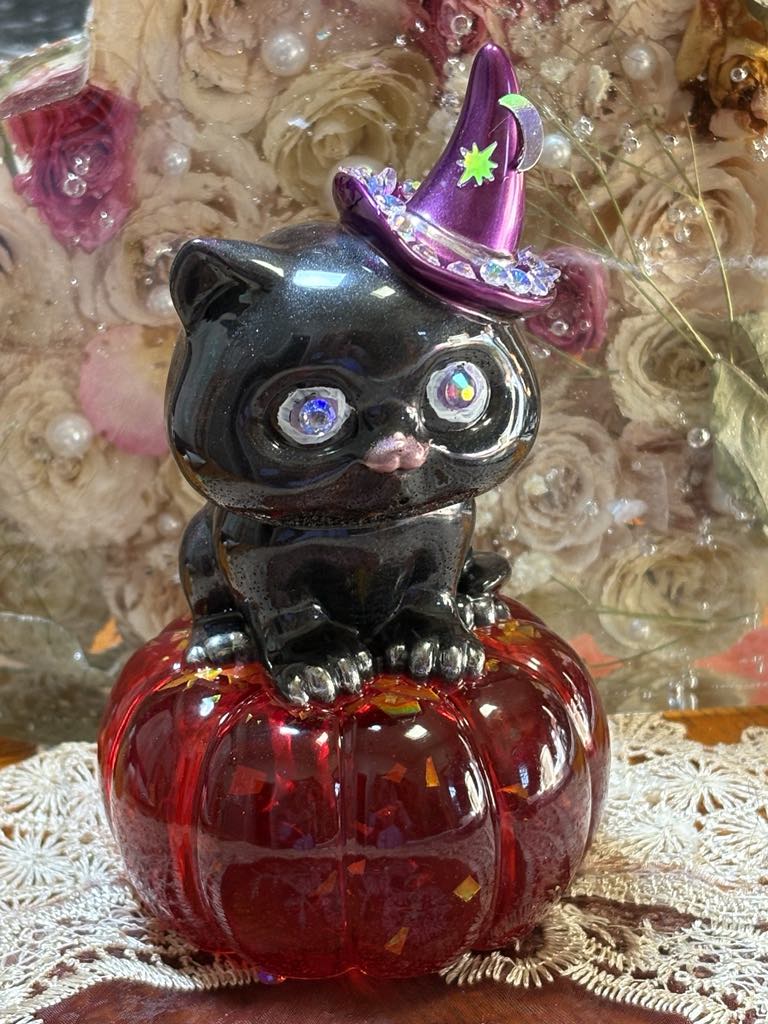 Celebrate the spooky season with this adorable Halloween Cat, crafted from high-quality materials for a festive touch to your décor or accessories. Perfect for Halloween enthusiasts, this charming piece is available for $20.00.