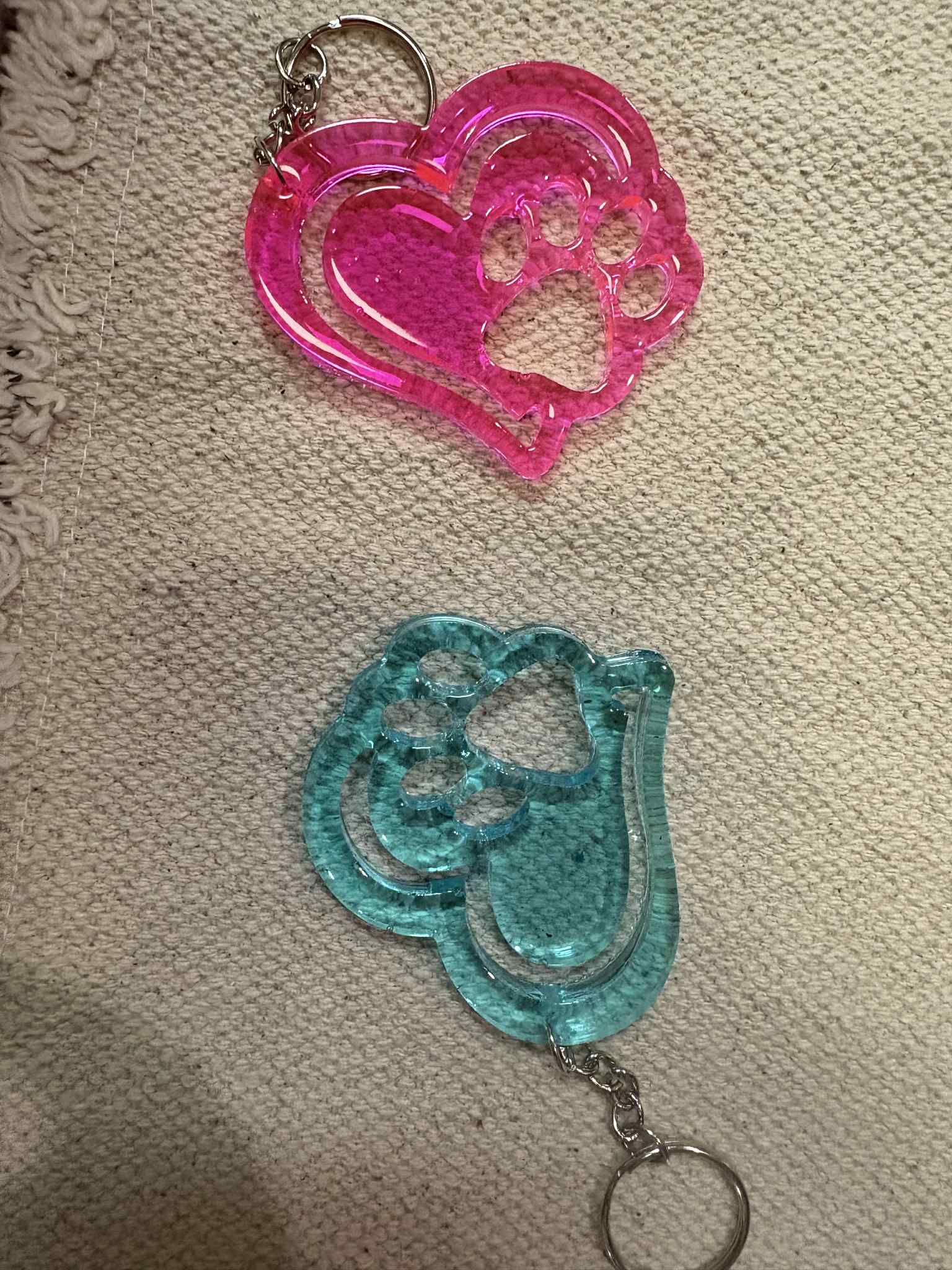This paw-shaped keychain is a thoughtful accessory for pet lovers, suitable for both dog and cat enthusiasts. Available in a variety of colors to match your personal style. $6.00