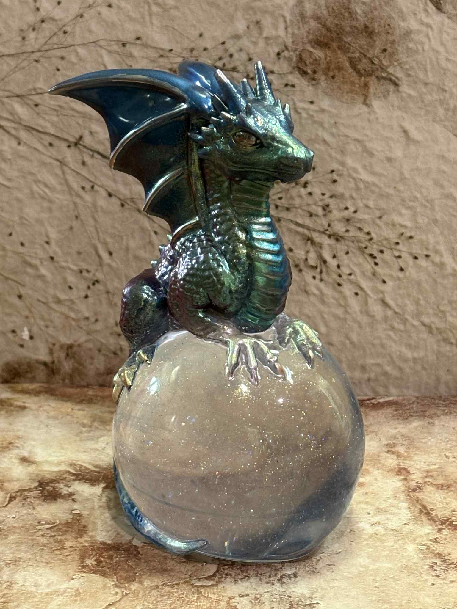 This crystal ball features a mystical design, making it an excellent tool for fortune-telling or a captivating decorative piece. Customizable options are available, starting at $40.00.