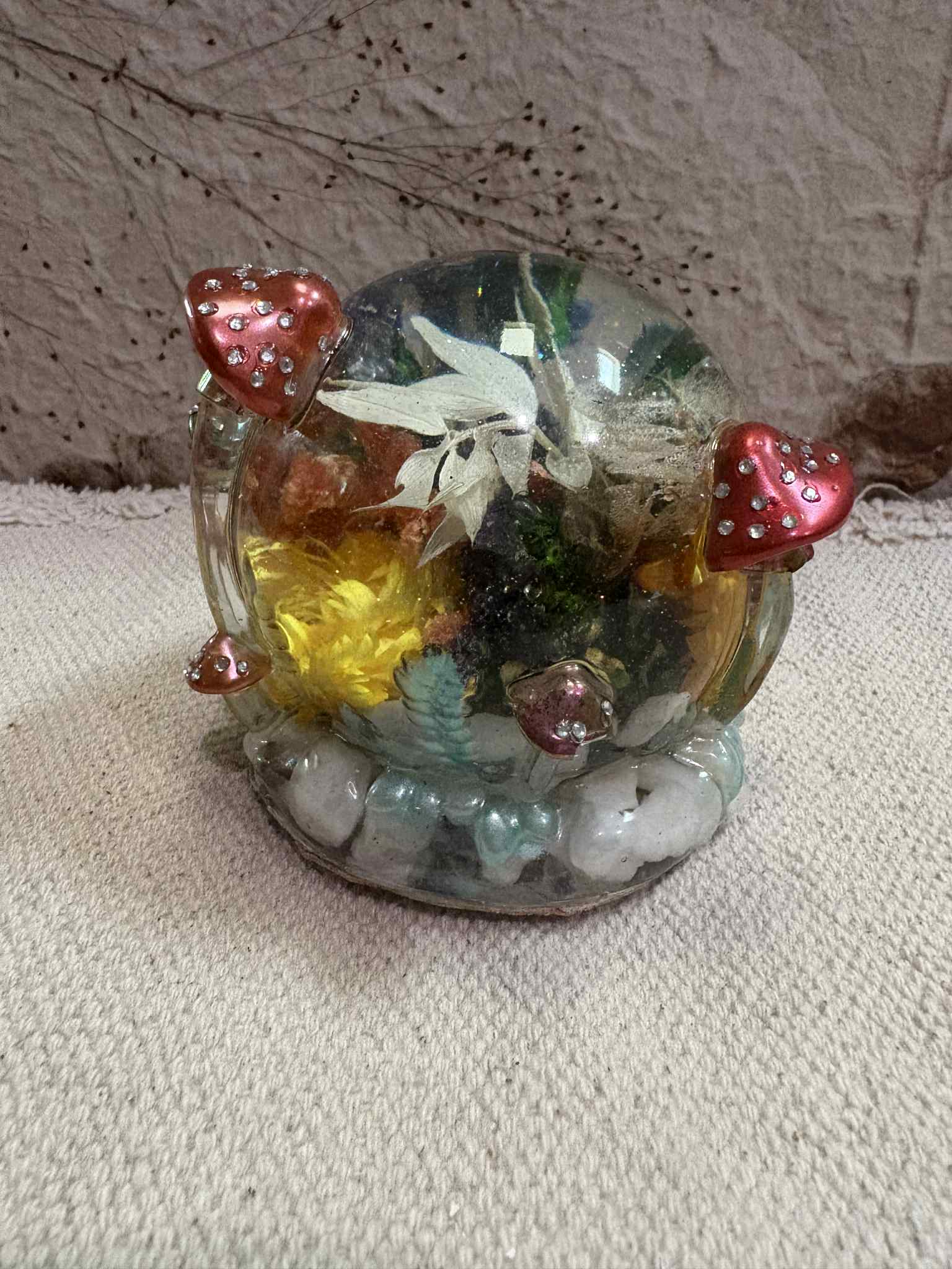 This crystal ball features a mystical design, making it an excellent tool for fortune-telling or a captivating decorative piece. Customizable options are available, starting at $40.00.
