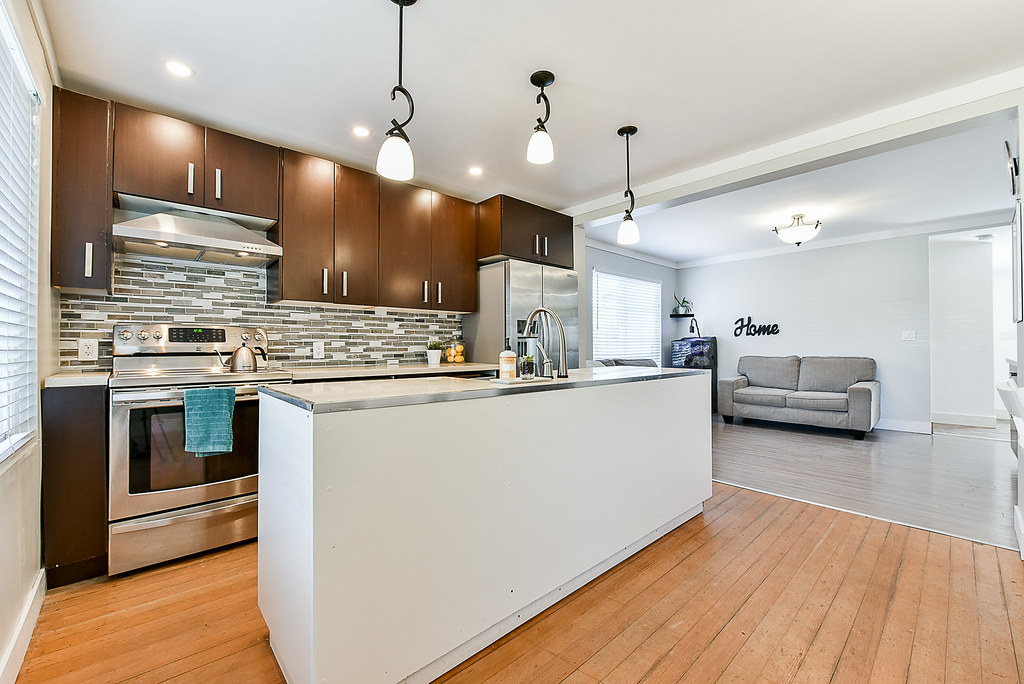 Kitchen, with 100 Y.O.Hardwood Restoration