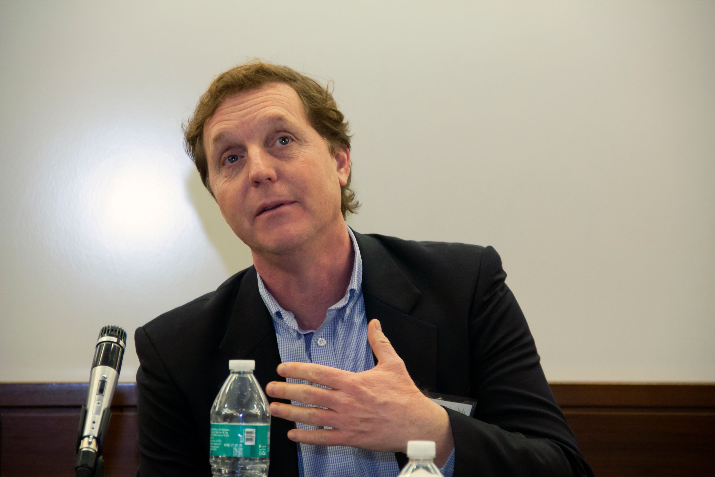 Steve Mischler speaking at a conference. 