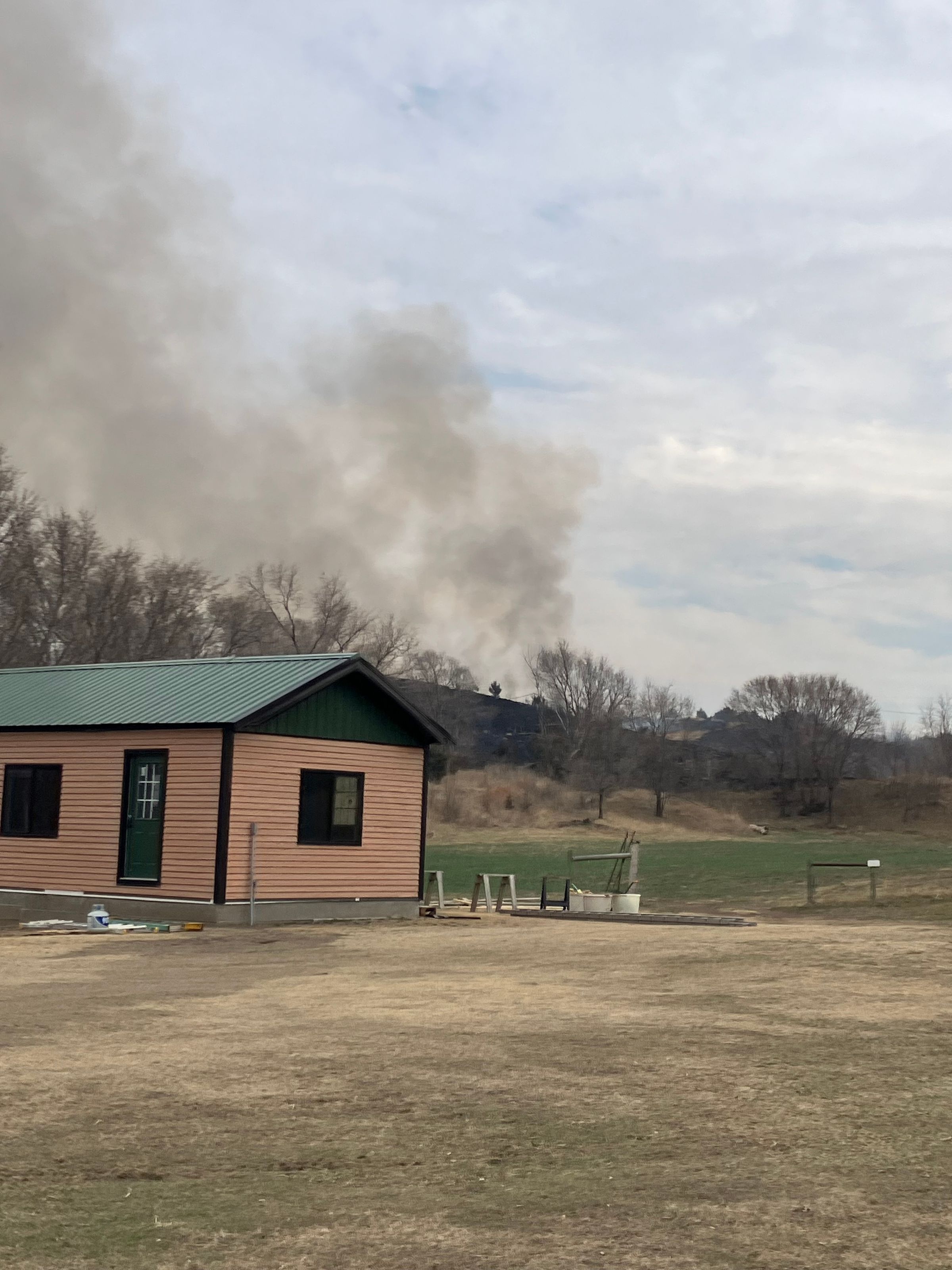 smoldering in distance