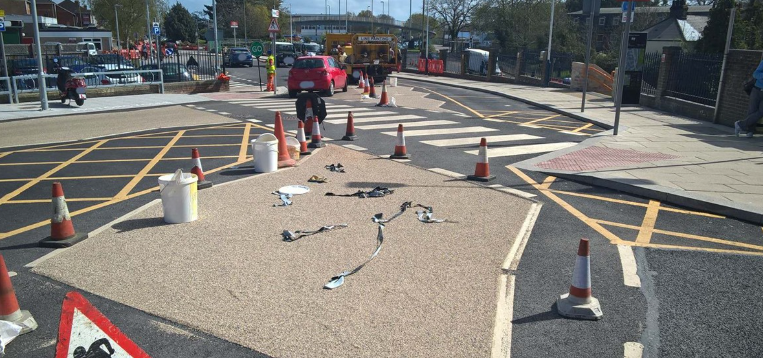 New antiskid being installed before a crossing.