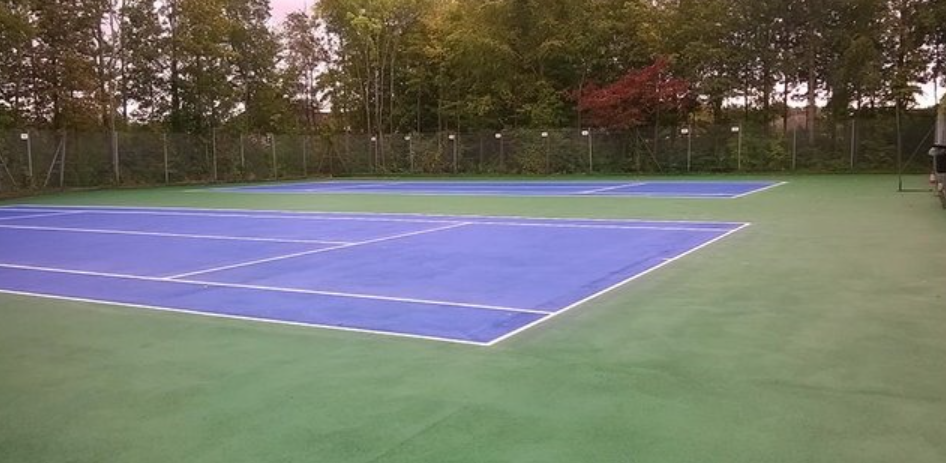 two Tennis courts after a full refresh.