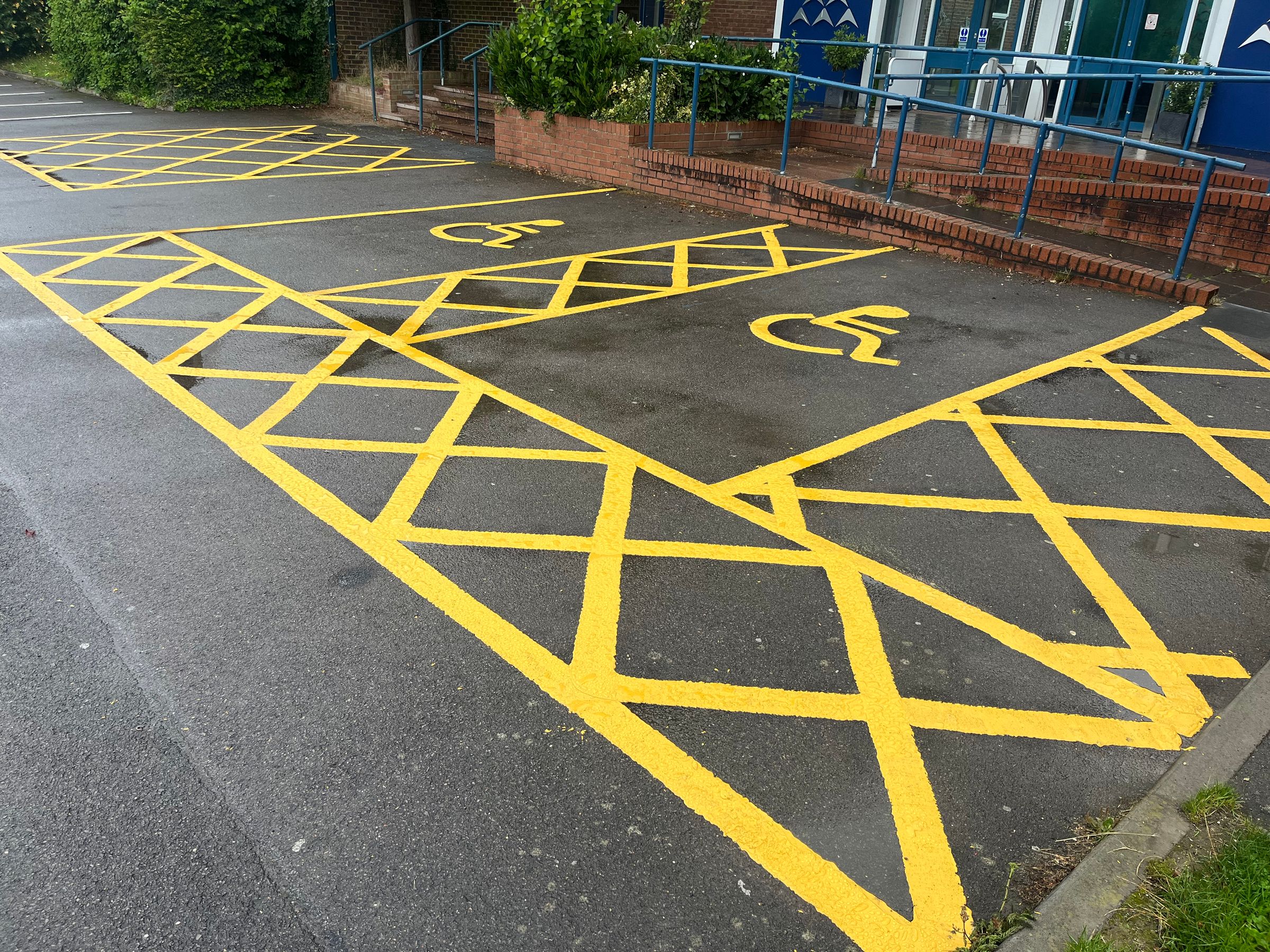 Two disabled bays at a school.