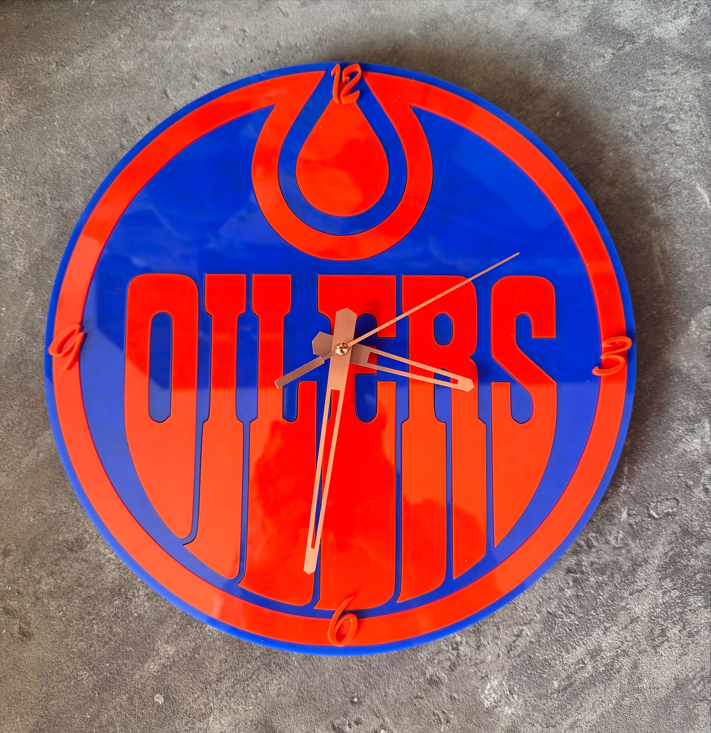 Acrylic Oilers clock starting at $60