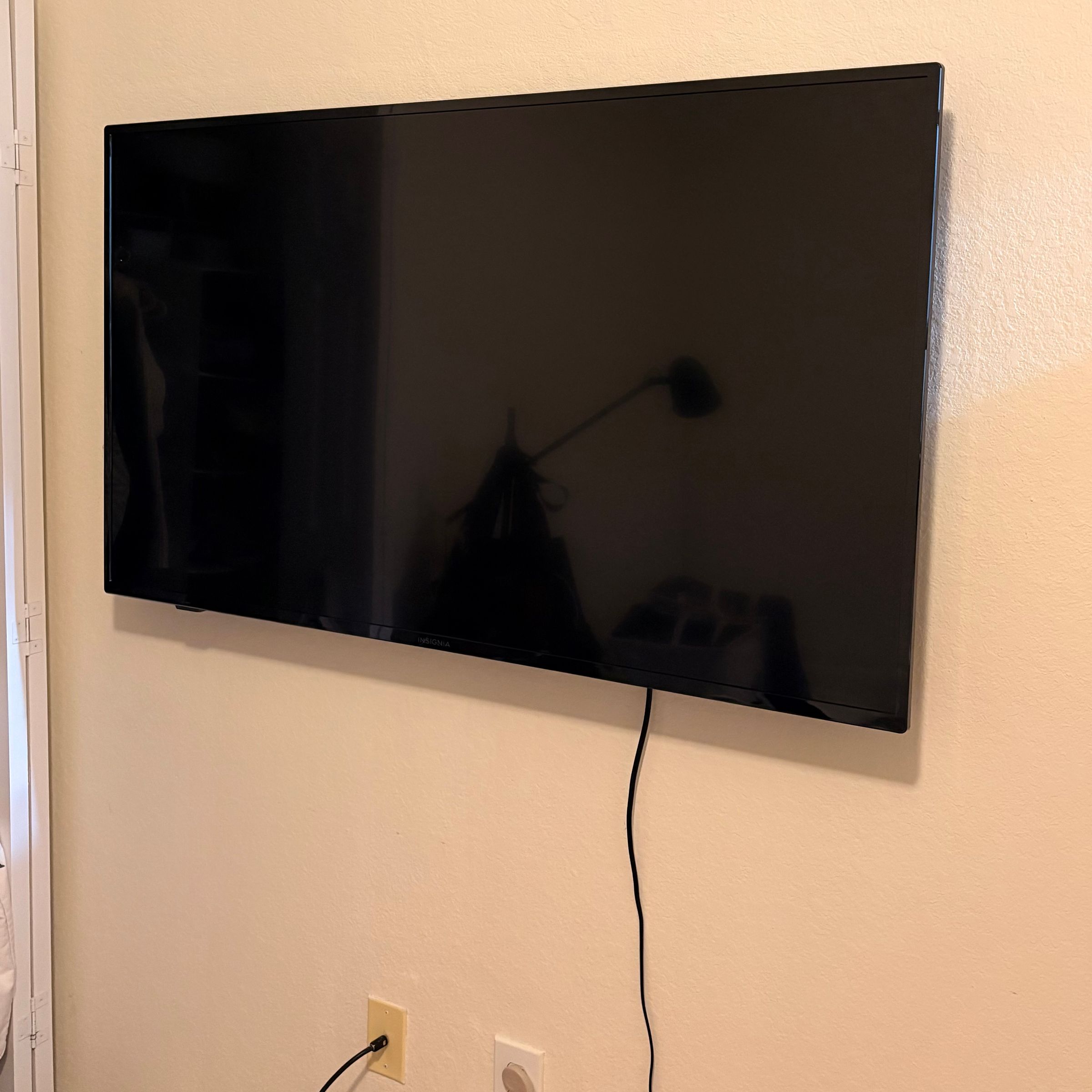 Wall mounted TV in Cutler Bay