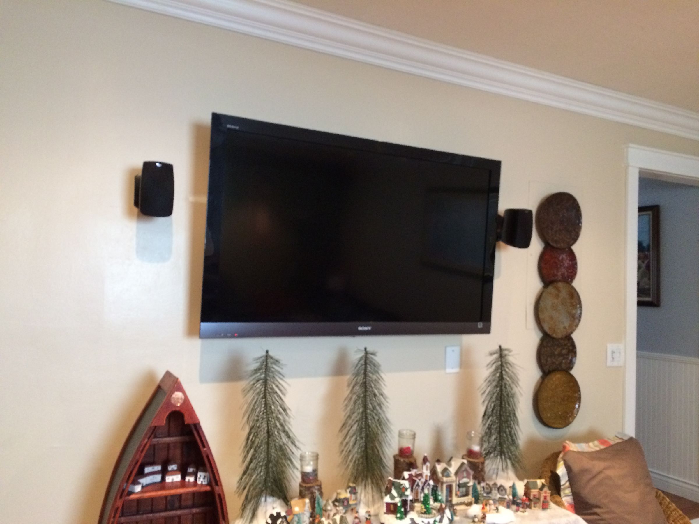 Wall Mounted TV with Mounted Surround Sound System Homestead FL