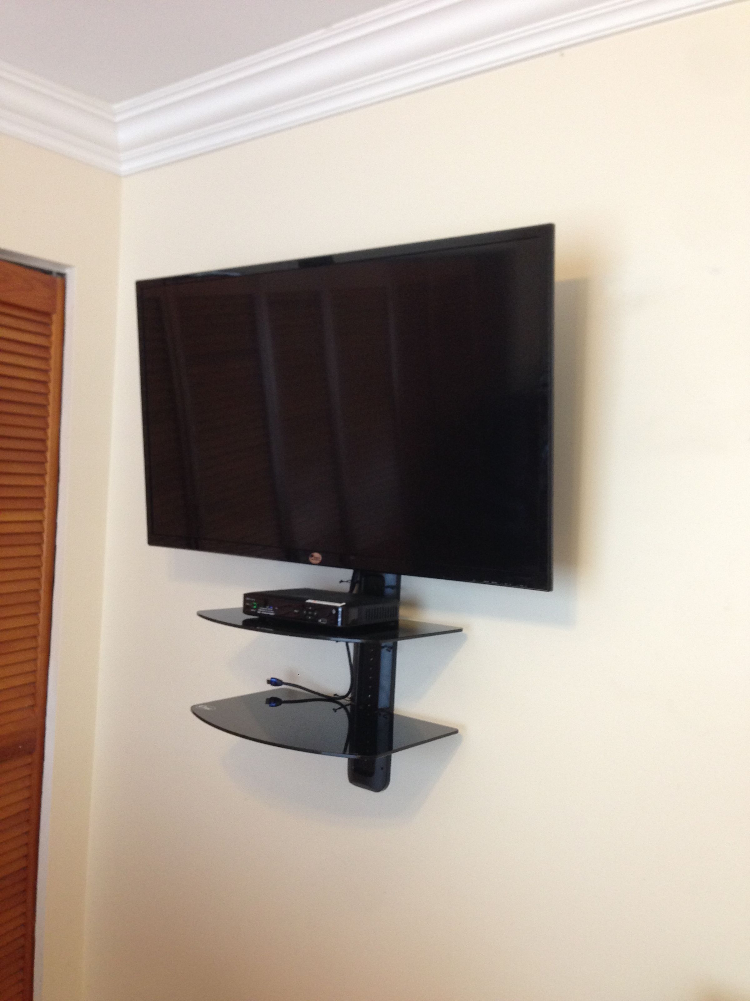 Professional flat-screen mounting service with shelf install in Cutler Bay, Florida.