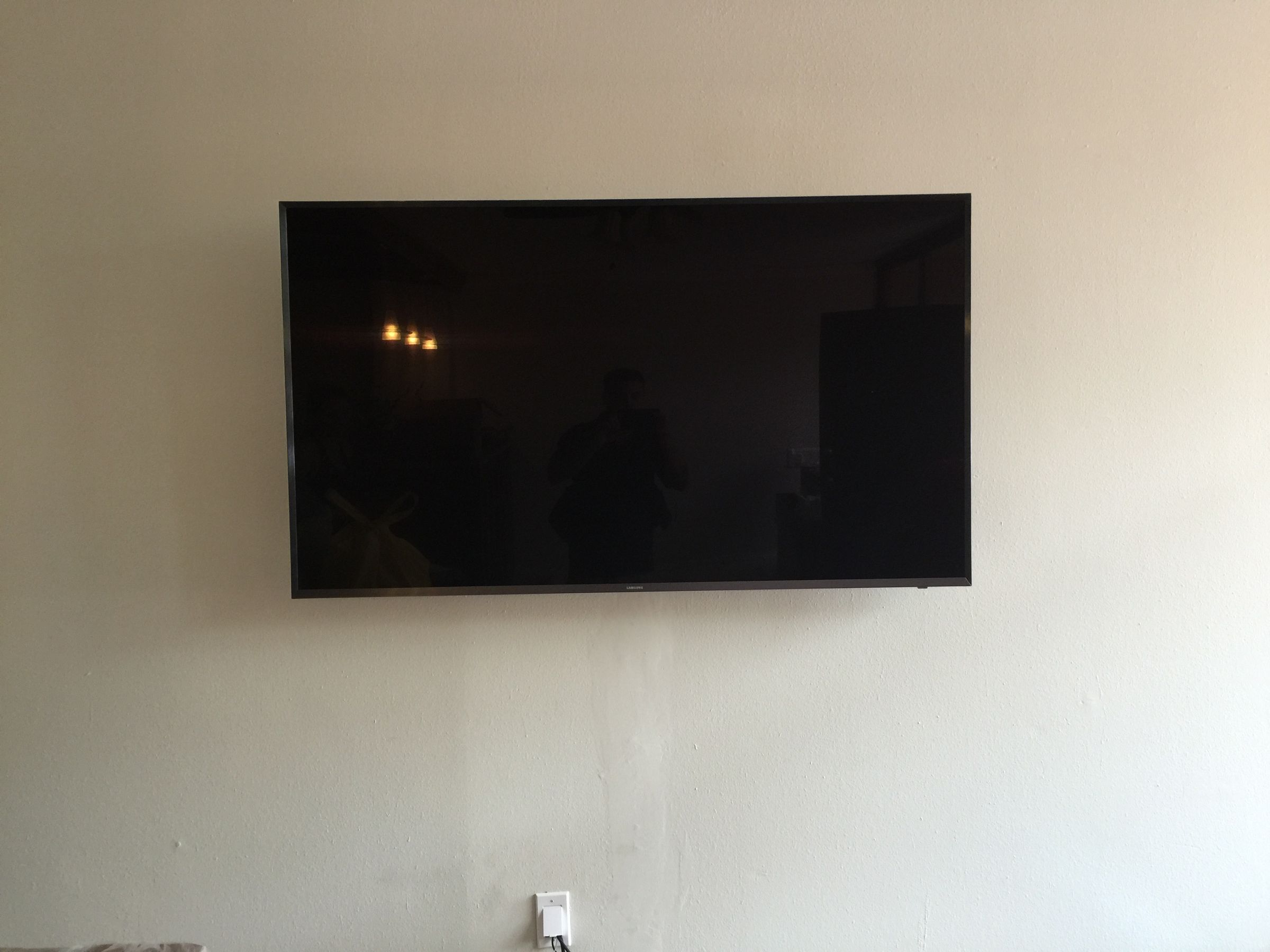 Living room TV mounting with clean finish performed by NowTech Pro in Homestead.