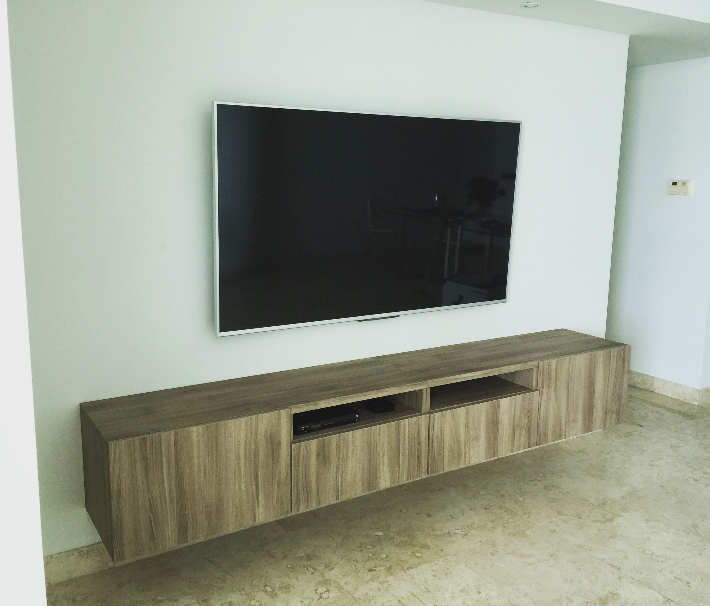 TV Mounting with Floating Shelf Unit in Cutler Bay