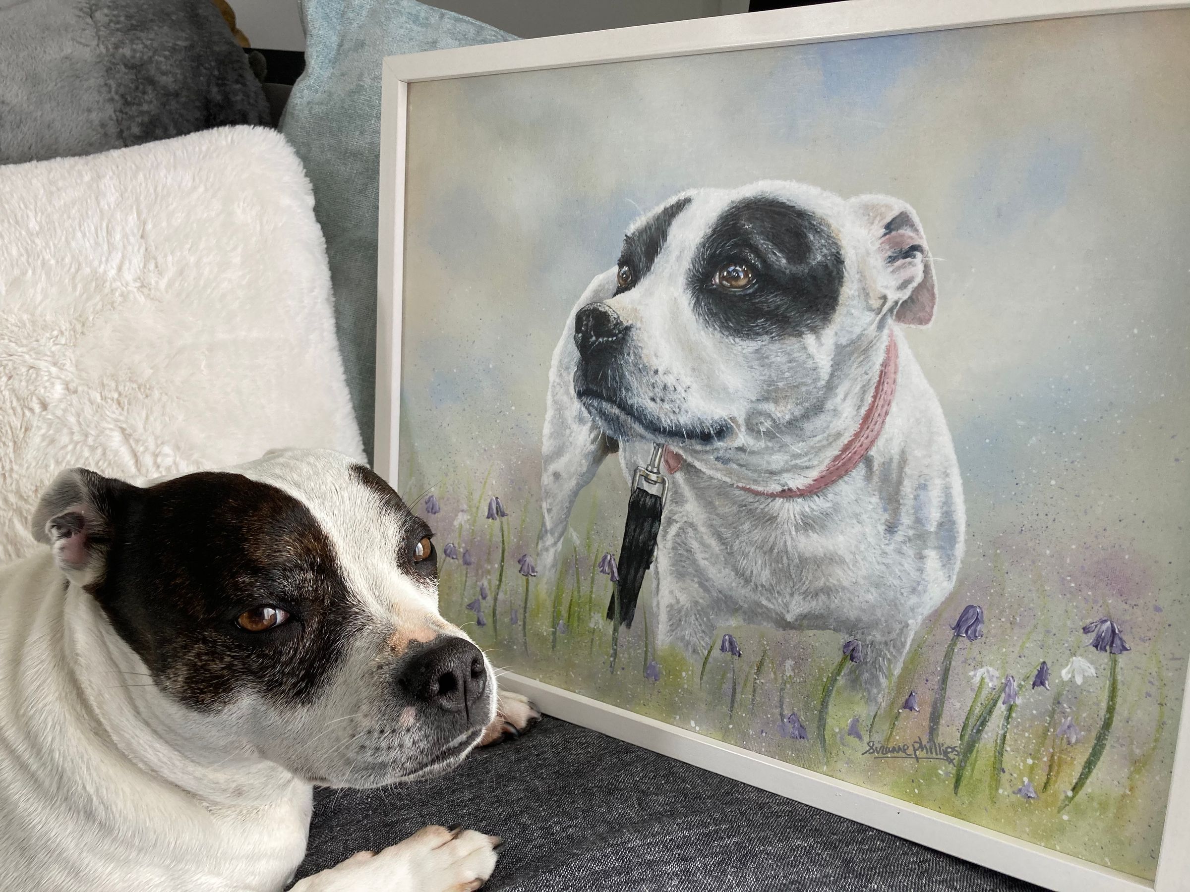 The portrait and the muse beautifully together.