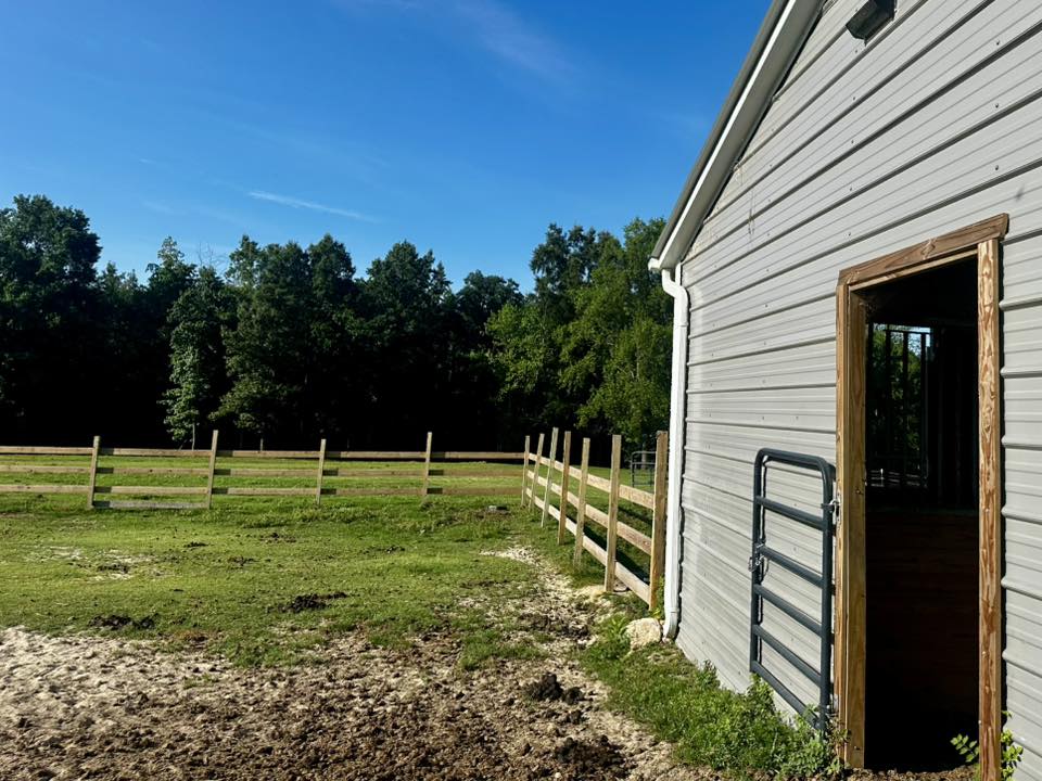 Back of the barn, connects to the oversized stall with a fan