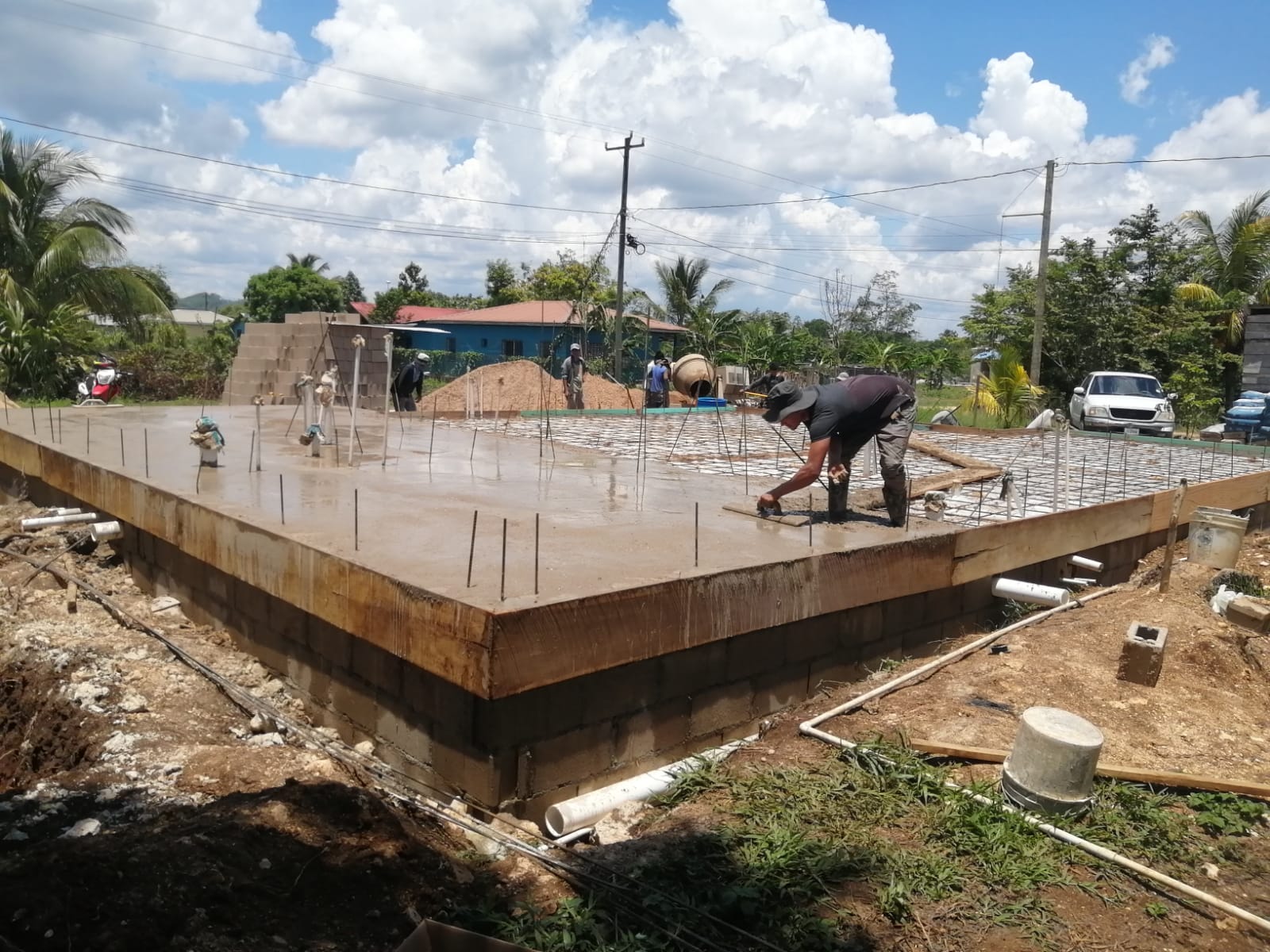 Concrete being placed on floor