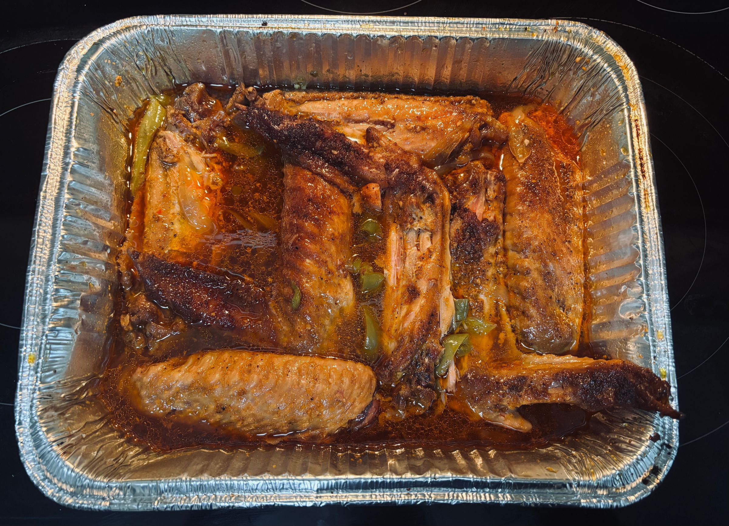 Smoked turkey wings marinated in savory spices for 24 hrs and then smoked to perfection 