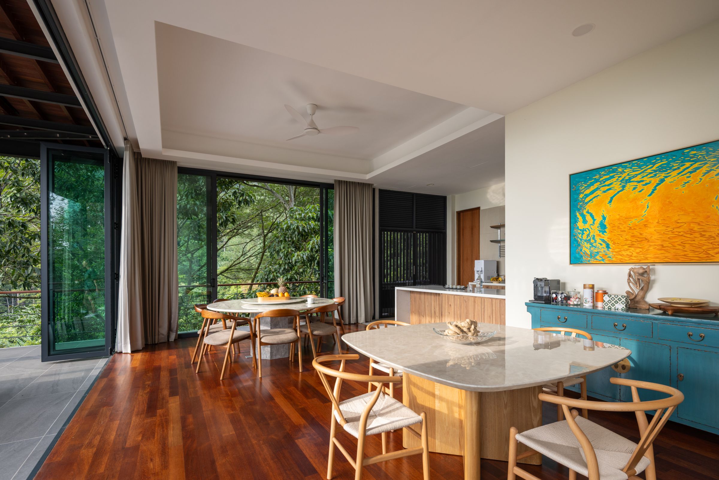 Dining table set for retreat guests beside the Janda Baik rainforest at SereneNest villa