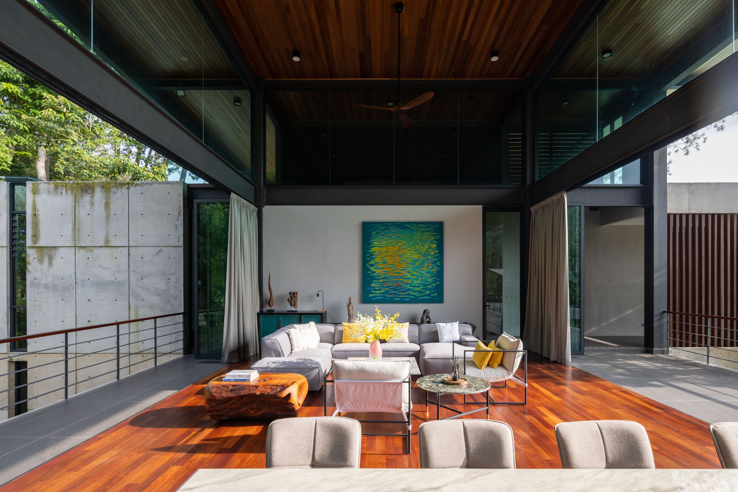 Quiet morning on the timber balcony at SereneNest retreat villa overlooking the rainforest