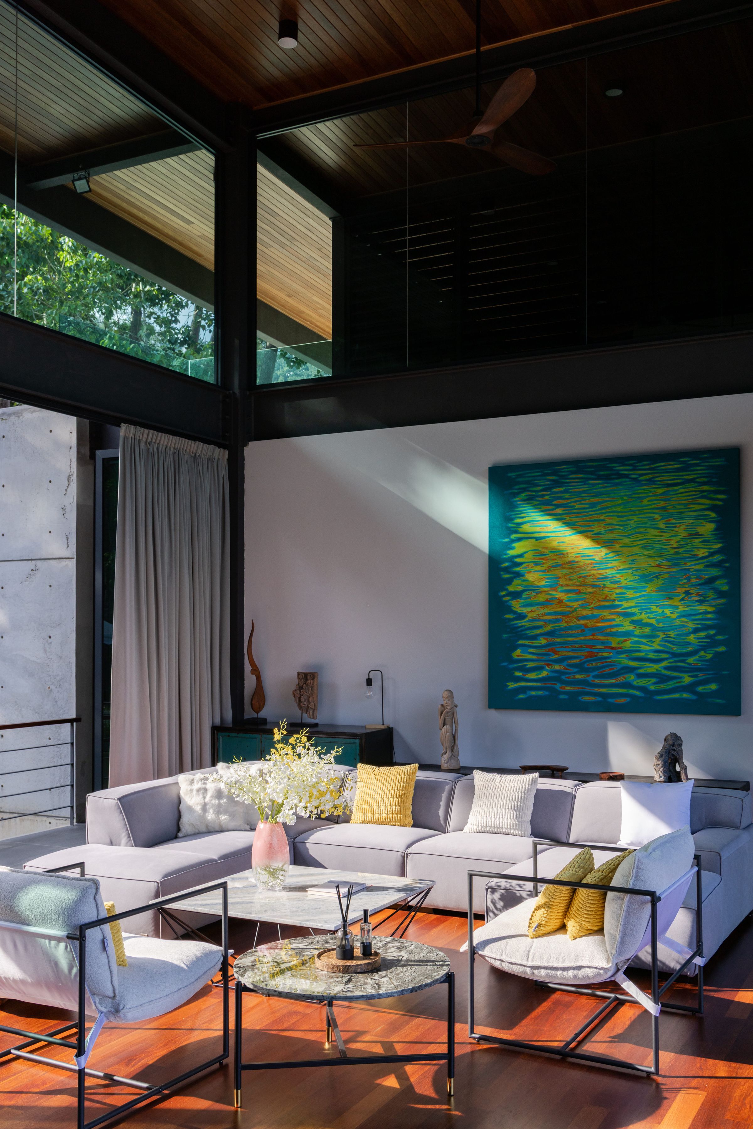 Infinity pool at SereneNest yoga retreat villa opening to the Janda Baik rainforest