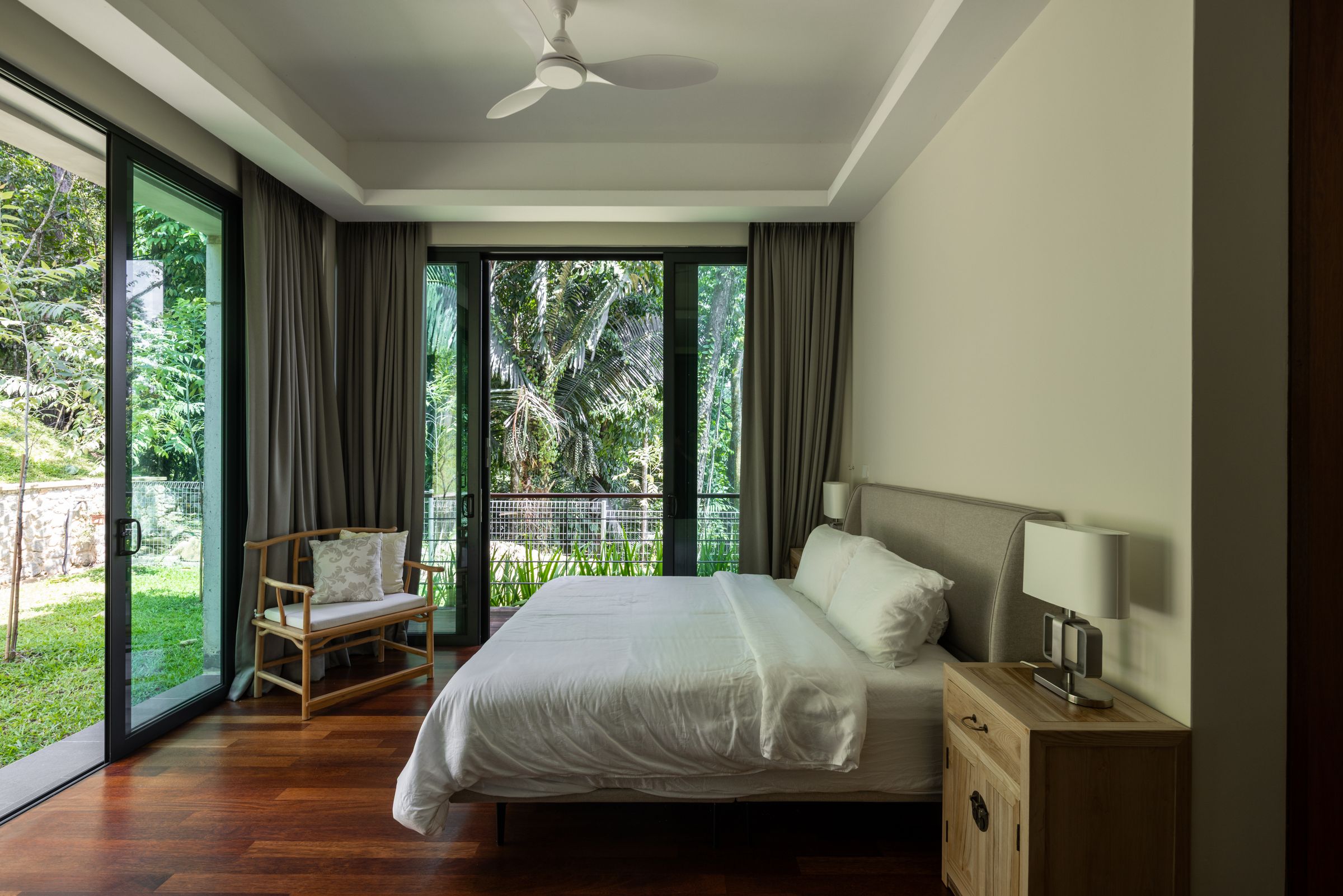 Dawn mist rising over the SereneNest villa and surrounding Janda Baik rainforest