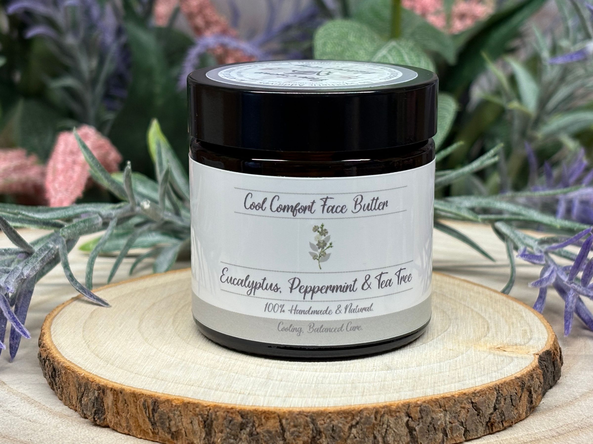 Refresh and nurture your complexion with Cool Comfort Face Butter—a gentle daily balm that tackles the unique challenges of facial skin. Lightweight yet deeply hydrating, it blends tallow, shea butter, calendula-infused jojoba, rosehip, and argan oils to deliver essential nourishment and help fortify the skin’s barrier. Peppermint, eucalyptus, and tea tree essential oils calm redness, soothe irritation, and offer natural cooling—perfect for skin prone to sensitivity, congestion, or breakouts. This botanical trio also supports clearer pores and helps combat environmental stressors, while antioxidant rosemary extract and vitamin E aid repair and resilience. Arrowroot and squalane refine texture for a soft, non-greasy finish. Ideal for hot, humid days or nighttime relief, Cool Comfort Face Butter restores clarity, comfort, and strength. Enjoy its clean, invigorating aroma and reveal skin that feels balanced, protected, and revitalized with every use.