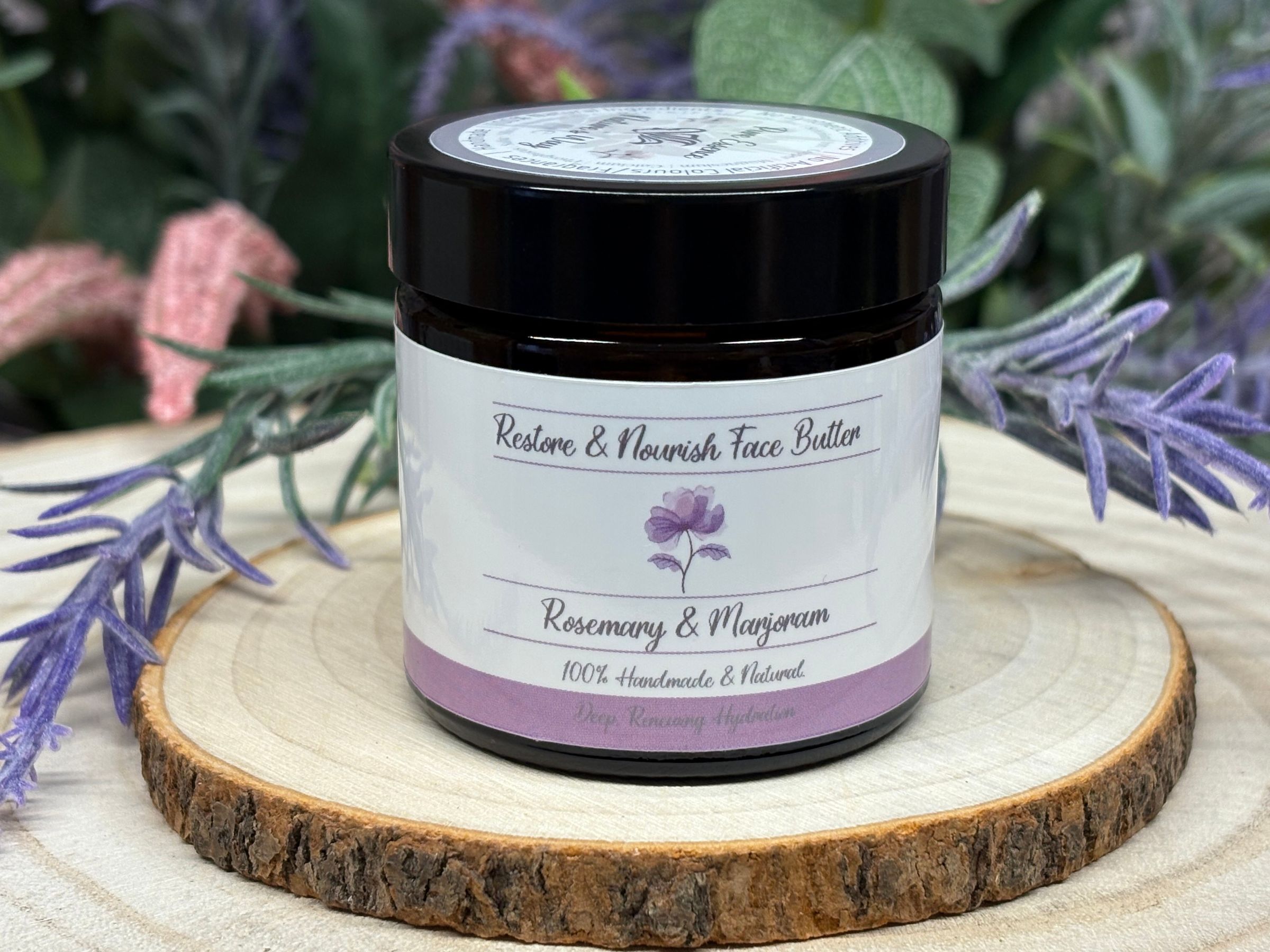 Restore & Nourish Face Butter is designed to comfort and revitalize complexion in need of repair and lasting moisture. Grass-fed tallow, shea, jojoba, squalane, and rosehip work together to deeply hydrate and soften, while olive oil infused with rosemary, castor oil, and arrowroot gently balance and support barrier function. Rosemary extract, vitamin E, and marjoram add powerful antioxidants to shield against daily stress and environmental harm. The formula absorbs quickly, delivering essential nutrients to help restore plumpness and resilience—ideal for dry, sensitive, or tired skin. With a subtle herbal aroma and a touch of marjoram for calming benefits, Restore & Nourish Face Butter soothes irritation and helps encourage natural renewal. Use morning and night for soft, replenished, and hydrated skin, and enjoy the comfort of knowing your complexion is protected and cared for with each application.