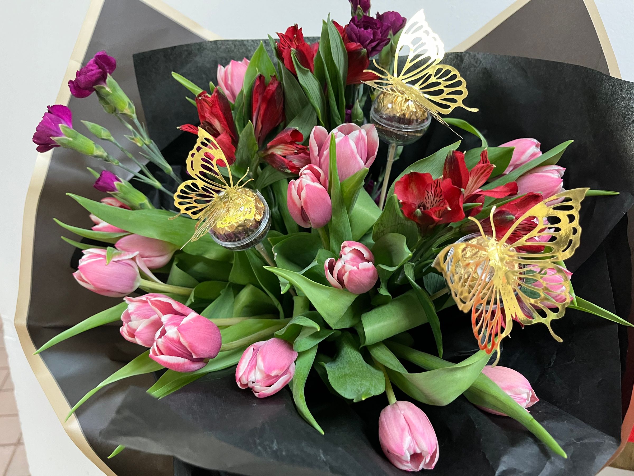 Tulips, Alstroemerias, and Hazelnut Ferrero Rochers with Foil Butterflies