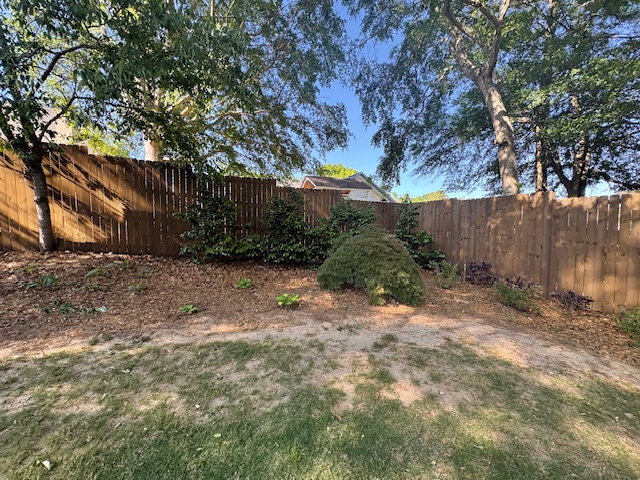 Fence, retaining wall and stairs stained & sealed (Barnwood) Columbus, Ga
