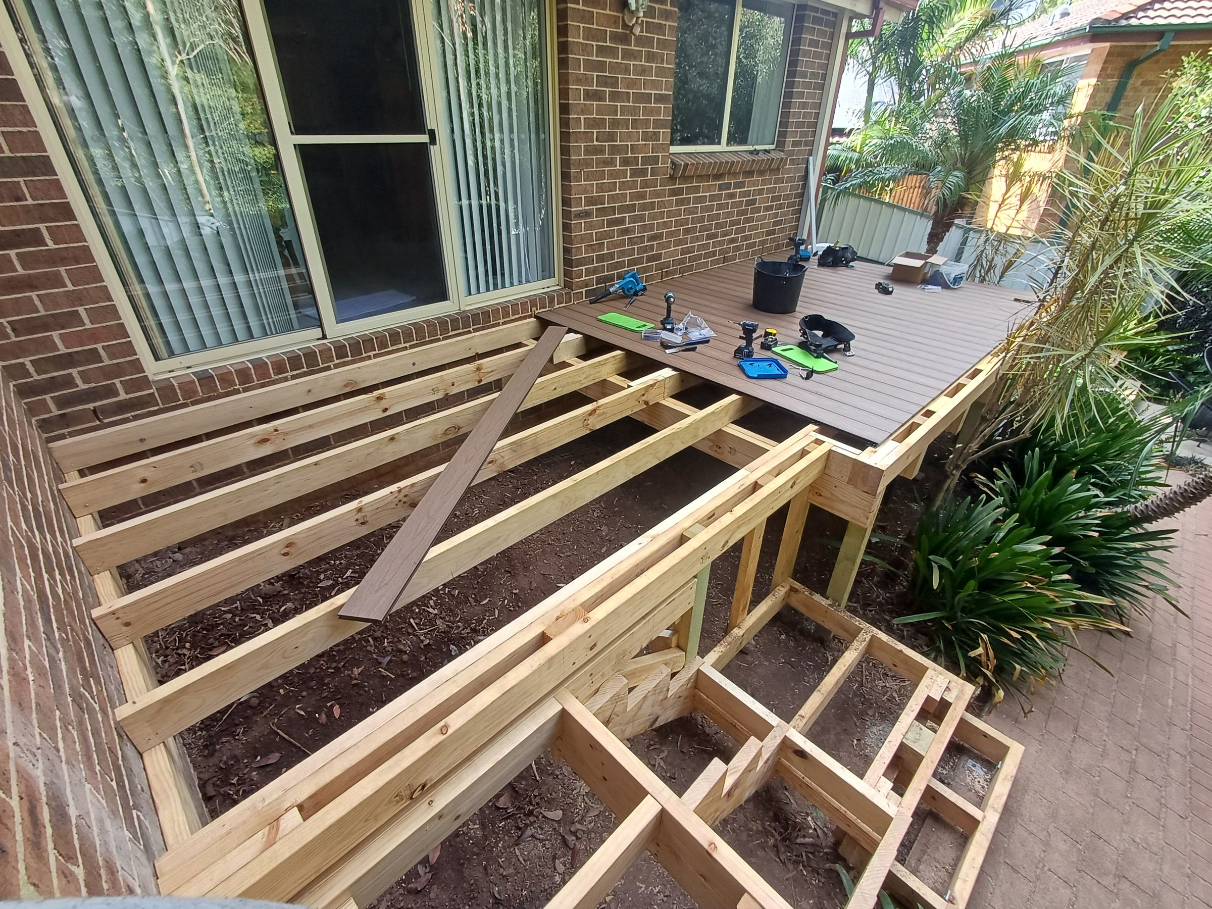 New structure with Composite decking set out and start laying