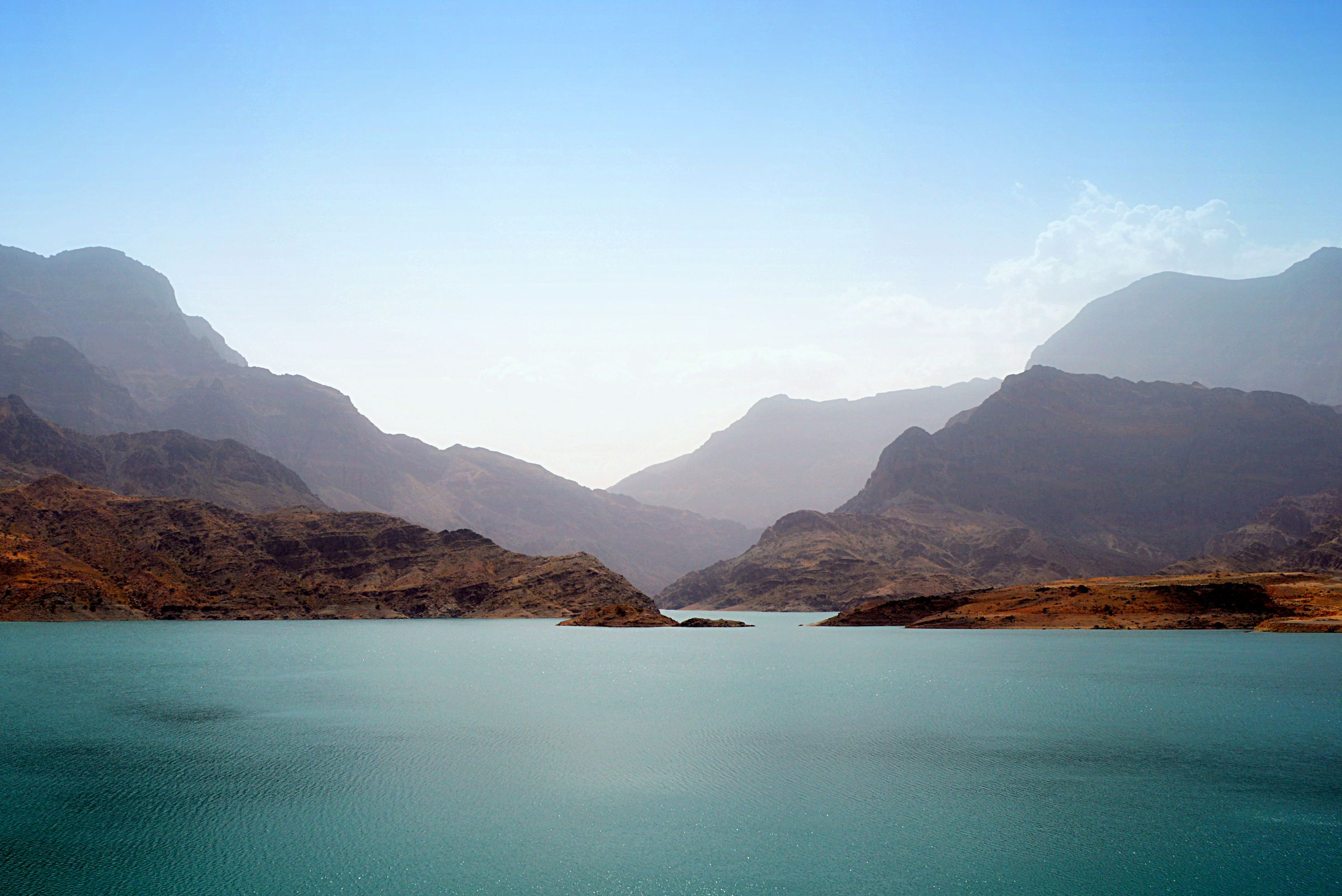 Layers of mountains fading into mist. (Wadi Dayqah Dam, Quriyat, Oman)