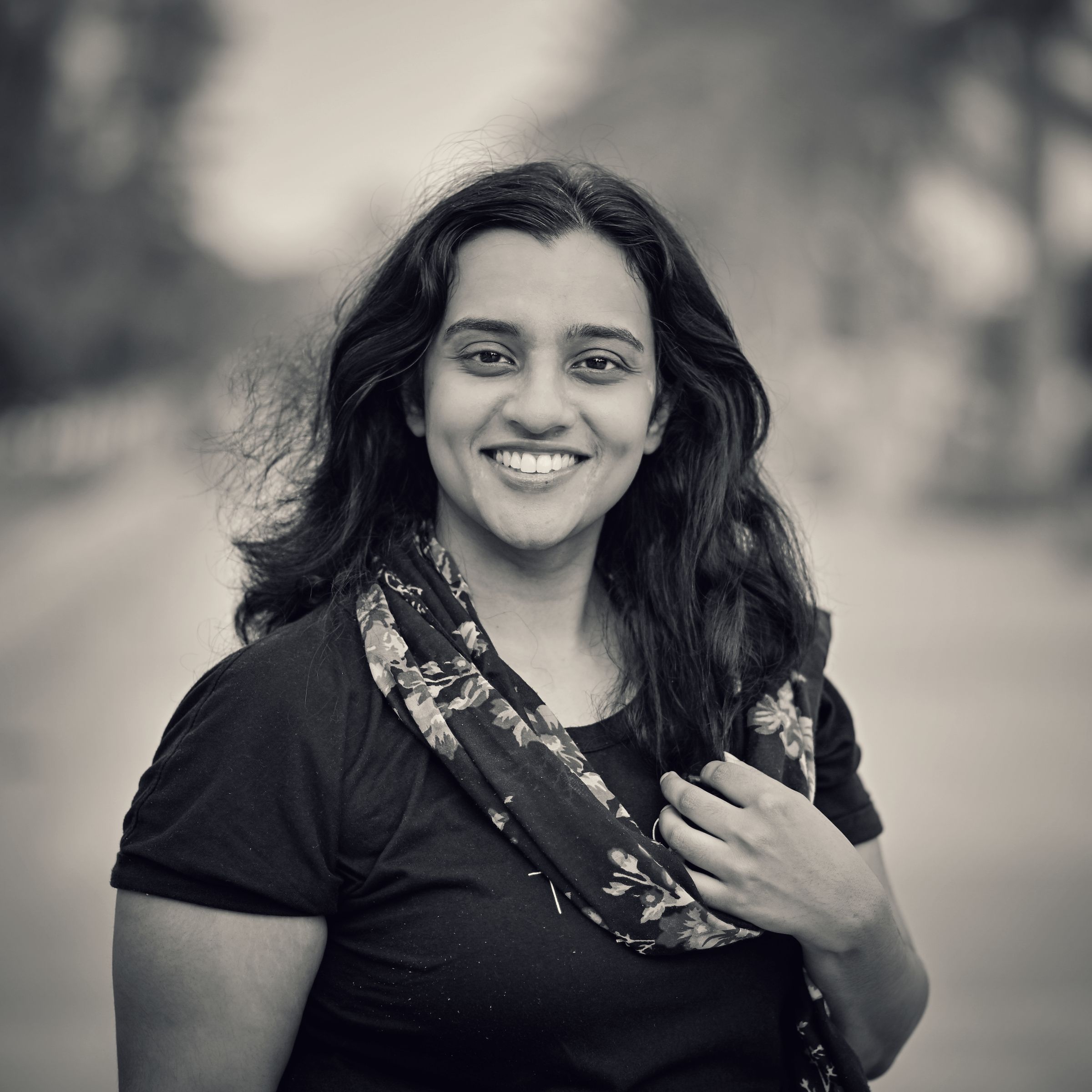 Smiles in Black & White – Candid happiness in timeless tones.