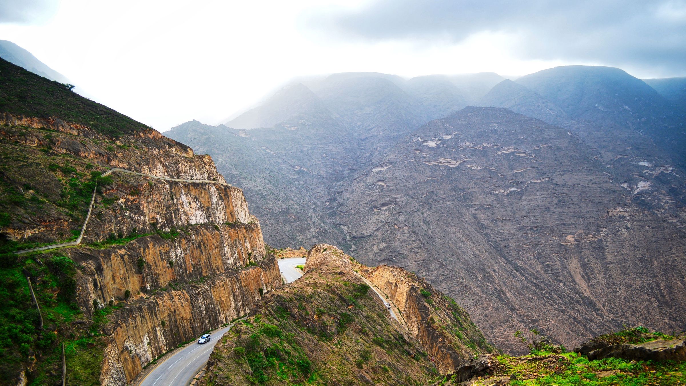 Light and shadow shaping the mountains. (Aqhishan road, Salalah)
