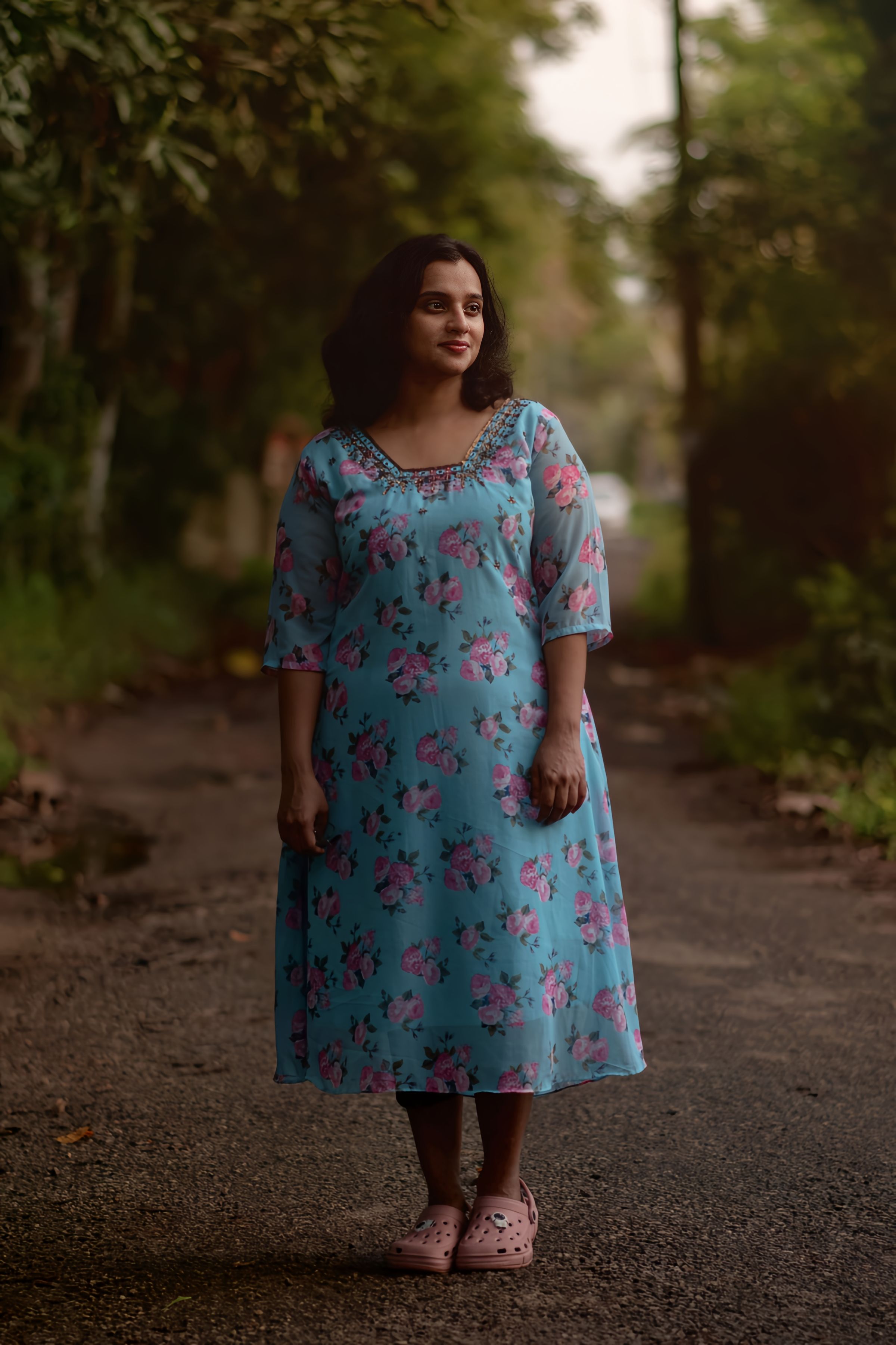 Walk in Bloom – Natural elegance framed by a floral dress.