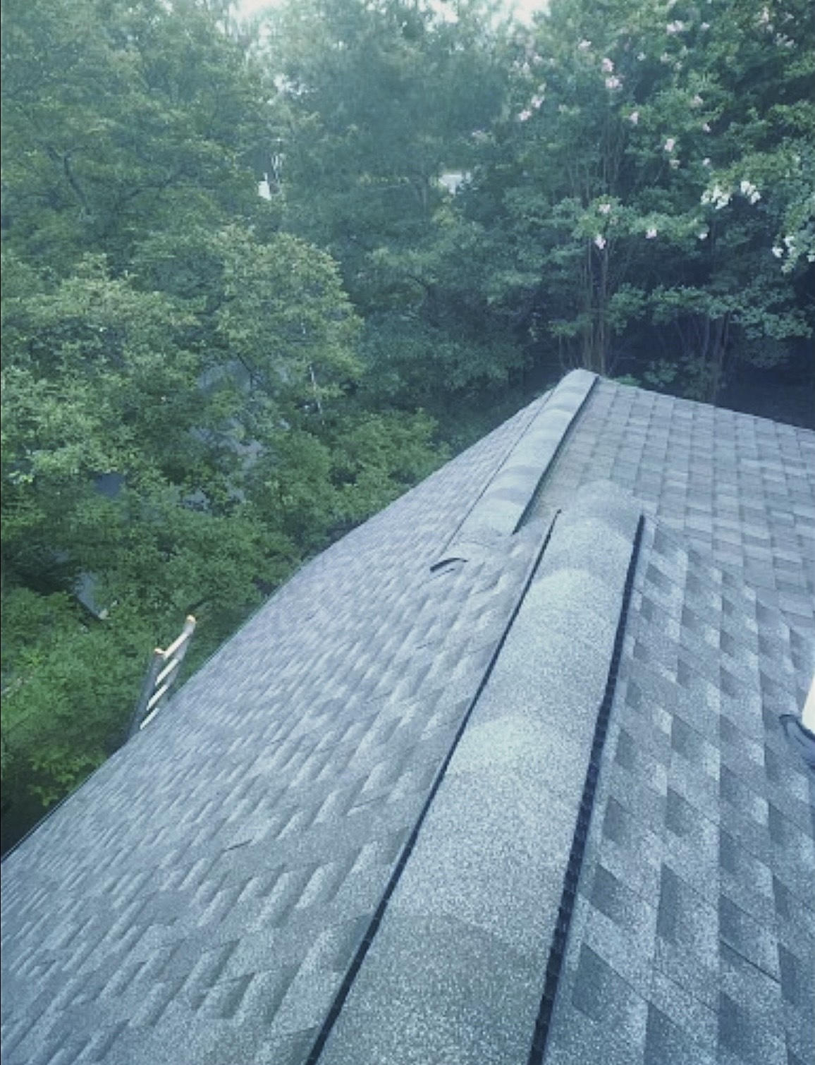 Replaced old slate roof with shingles!