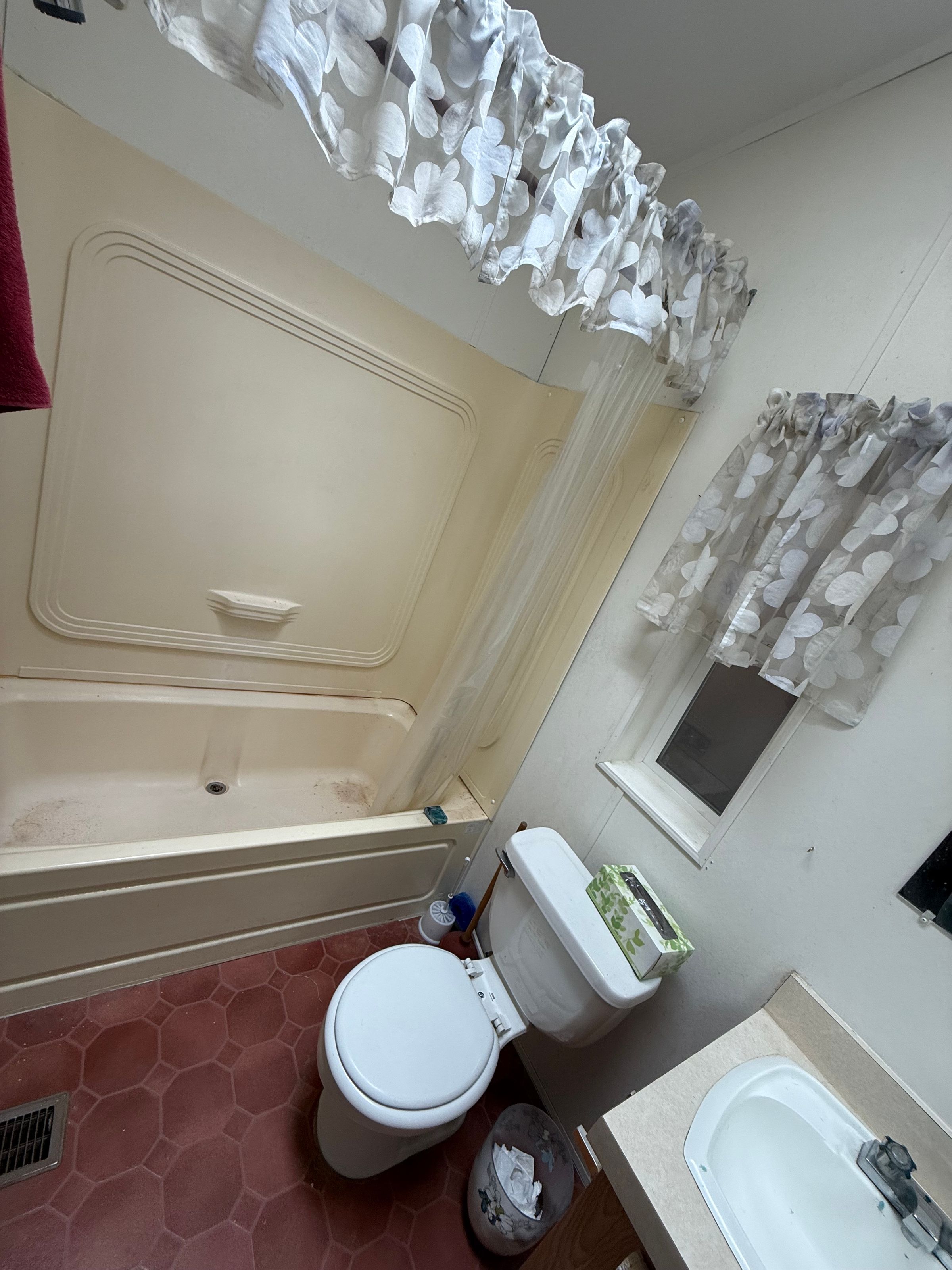 Old standees bathtub shower! Very badly installed and was leaking