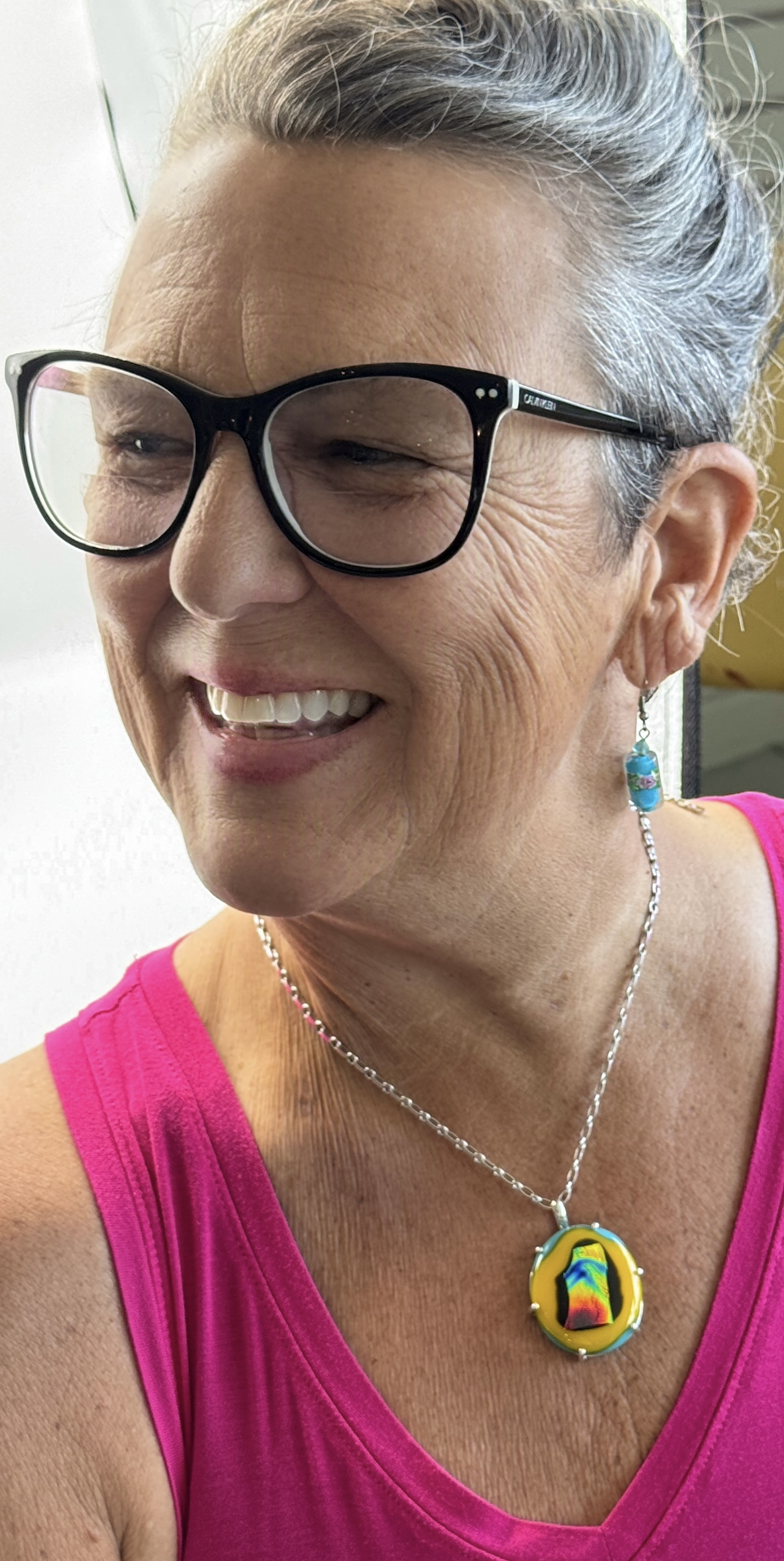 Amy wearing my rainbow dichroic pendant.