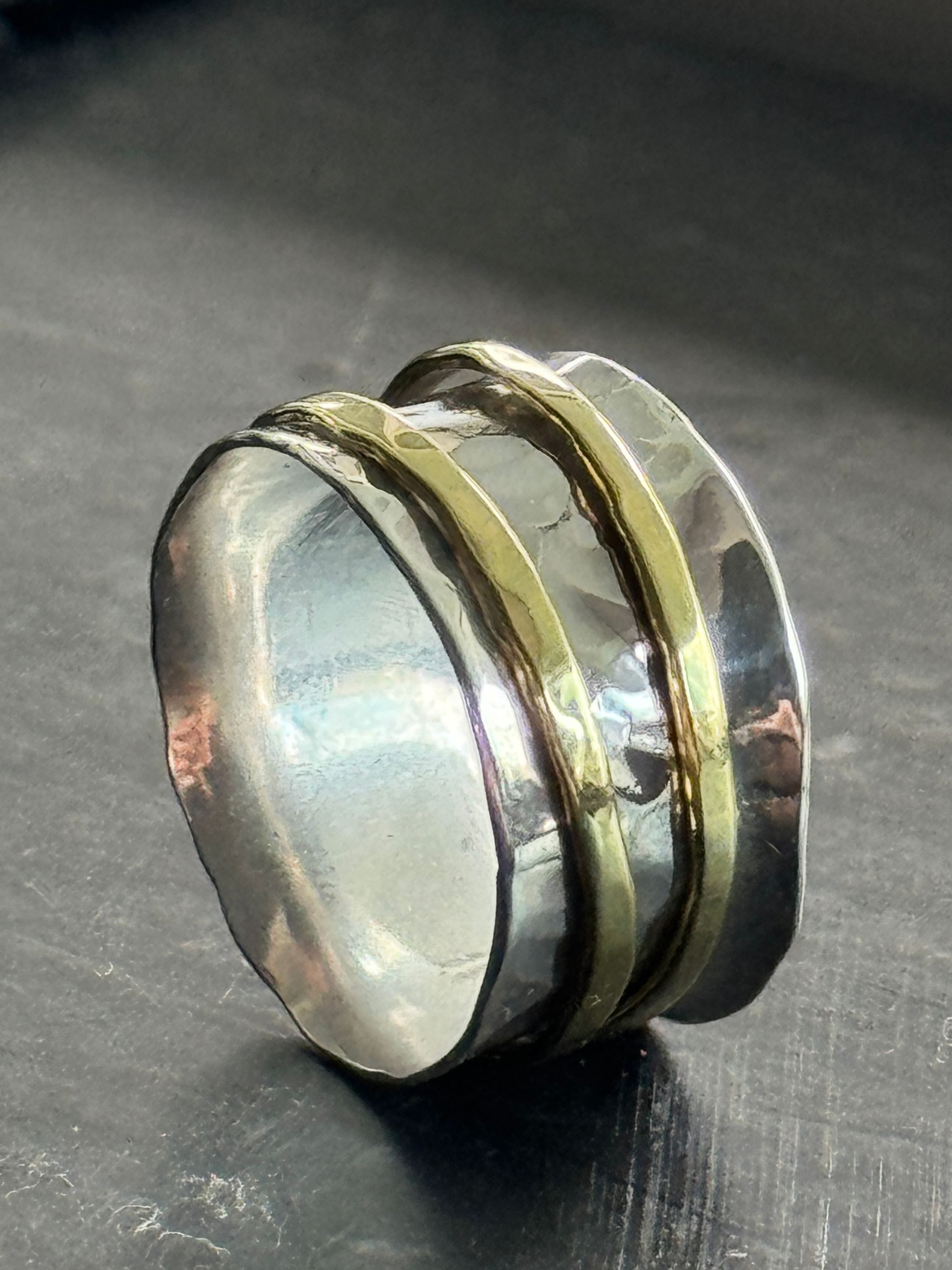 Sterling and brass spinner ring