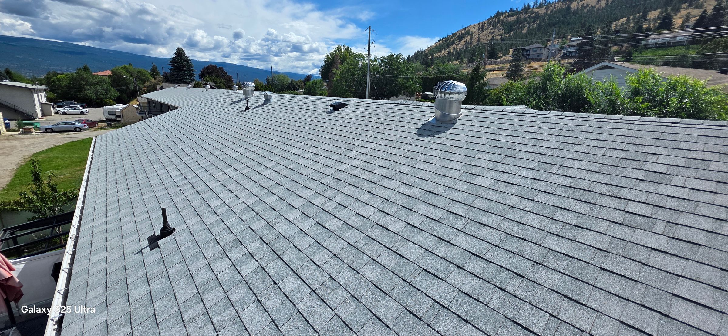 Multi-family asphalt shingle reroof on residential property in Peachland BC by Horizon Roofing and Metal Works