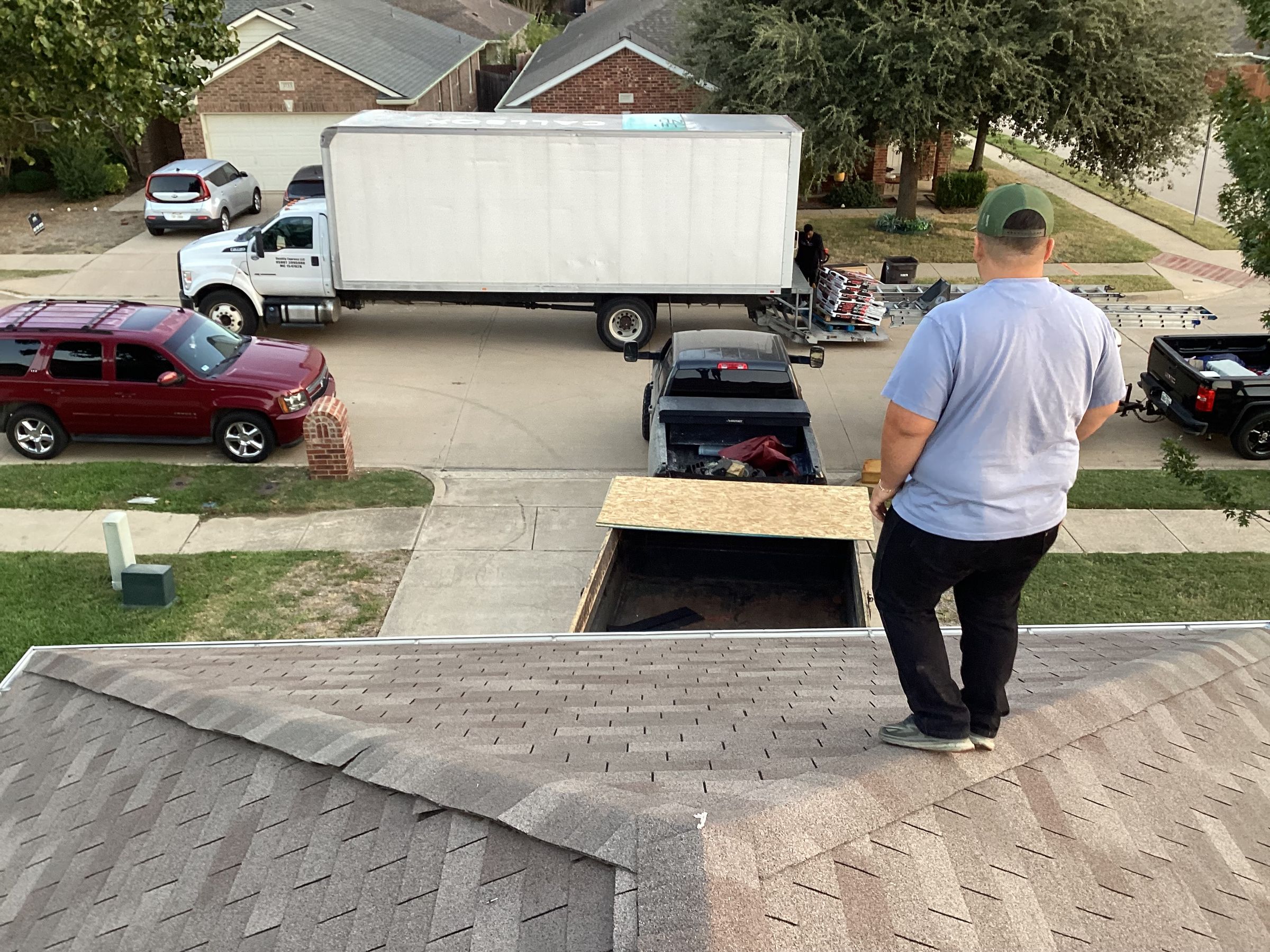 Project Manager overseeing material drop