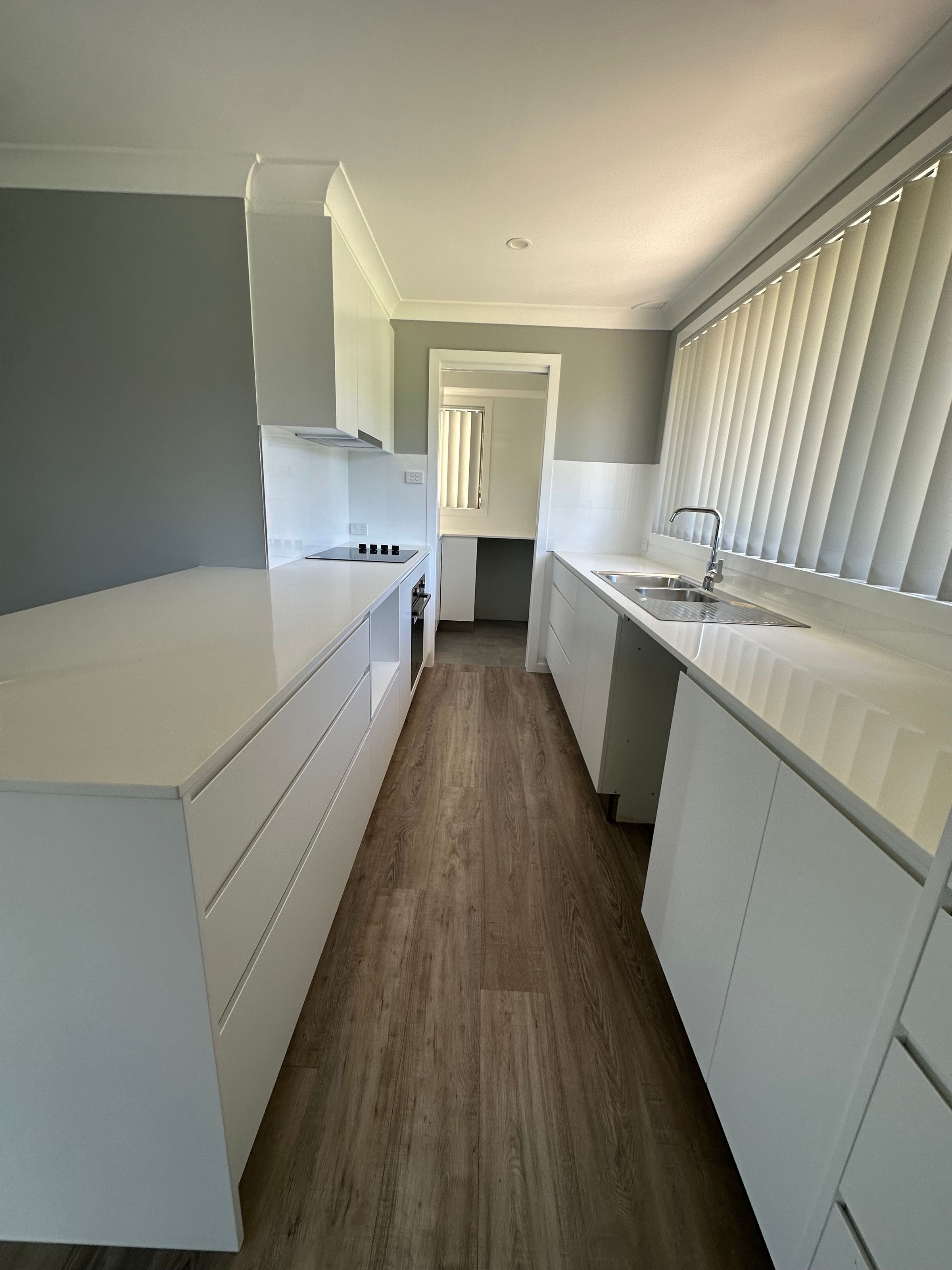 Polar white MDF in shark nose handles - 20 mm stone Benchtop