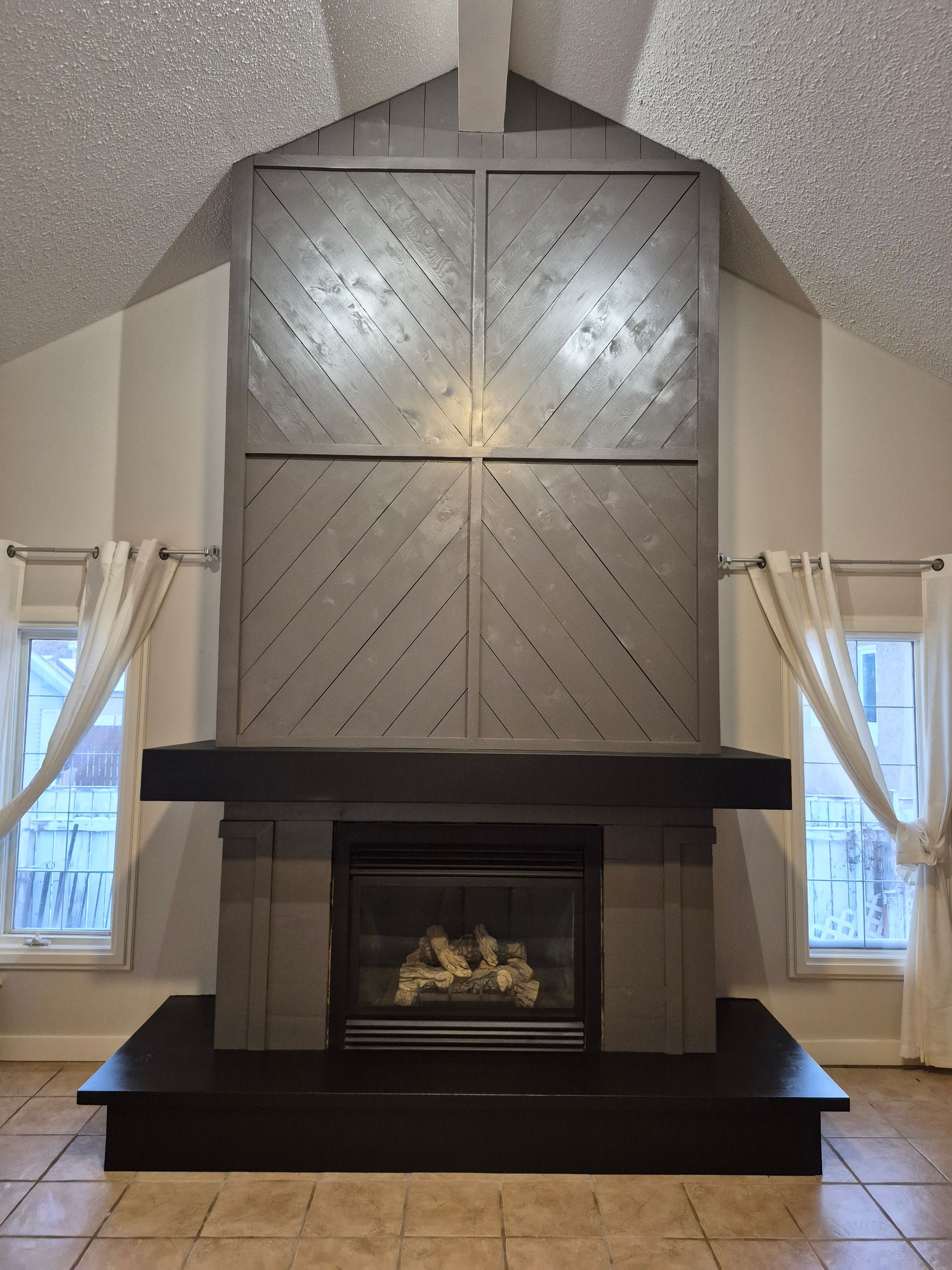 Custom chevron patter with steel mantle and a solid fur sill with different pattern designs to draw your eyes