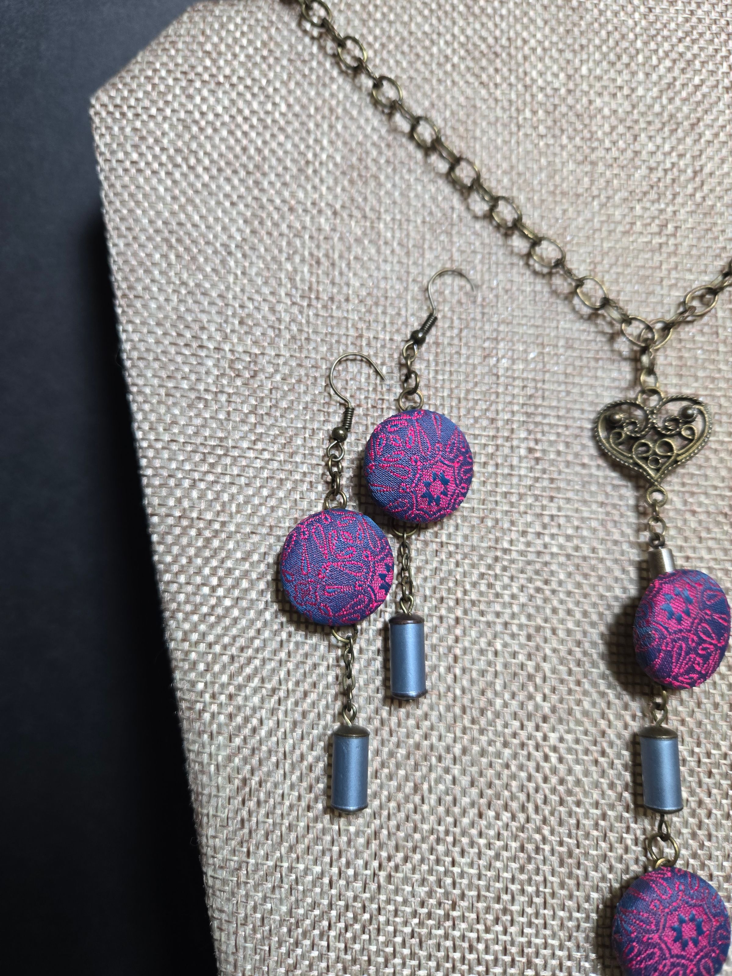 details of necktie and knitting needles used