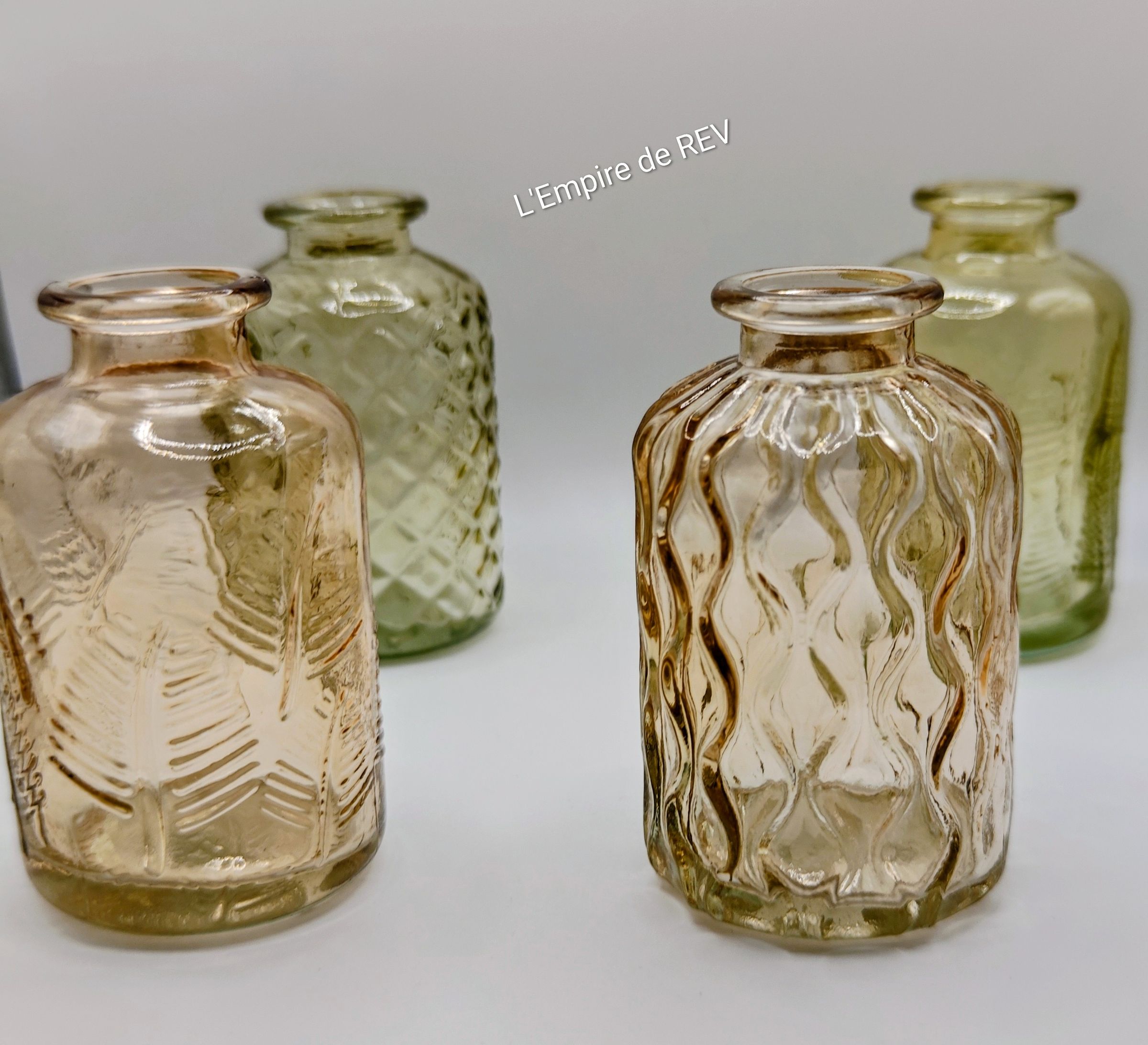 Bouteille en verre pour bouquet de fleurs en bougie