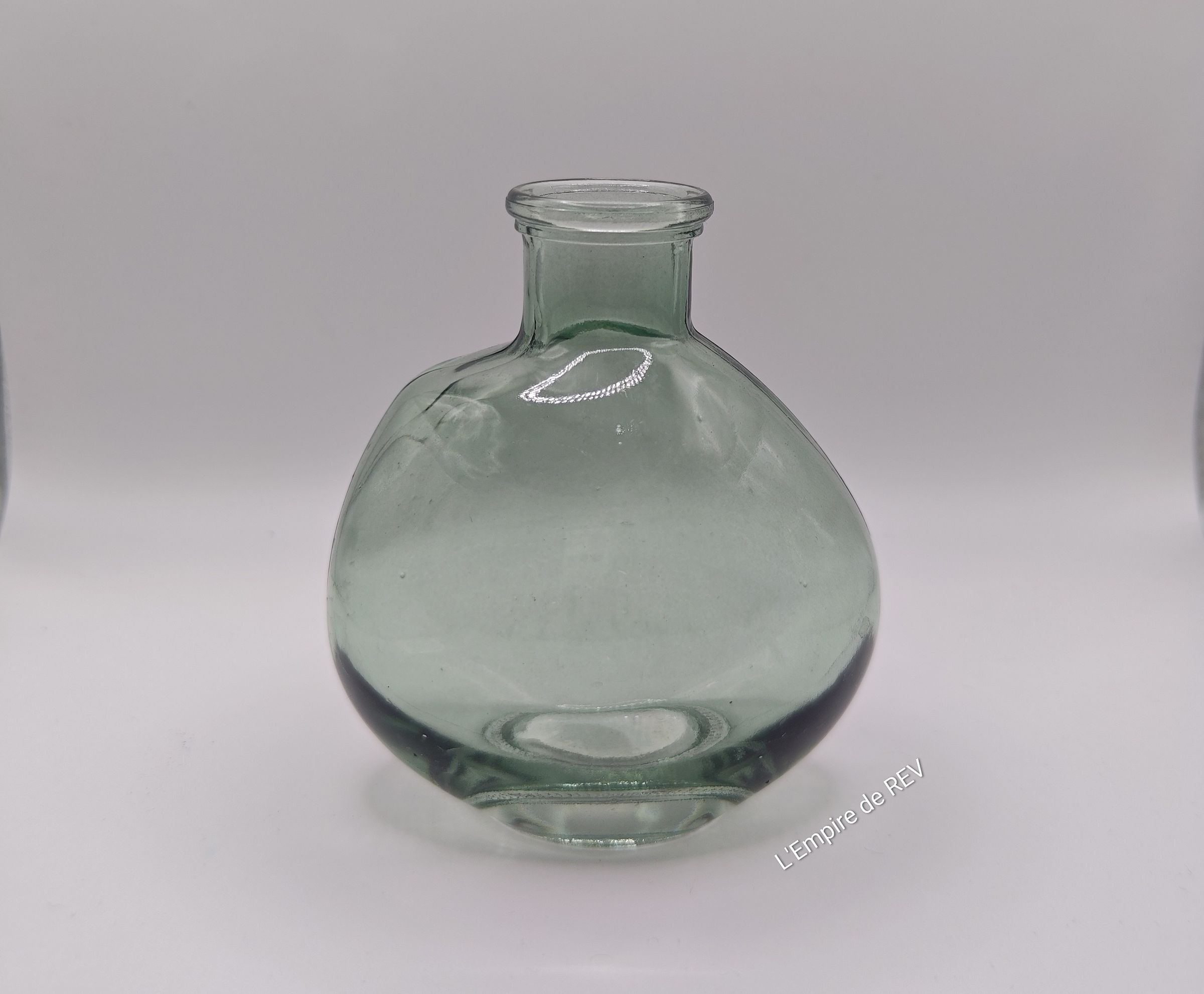 Bouteille en verre pour fleurs en cire