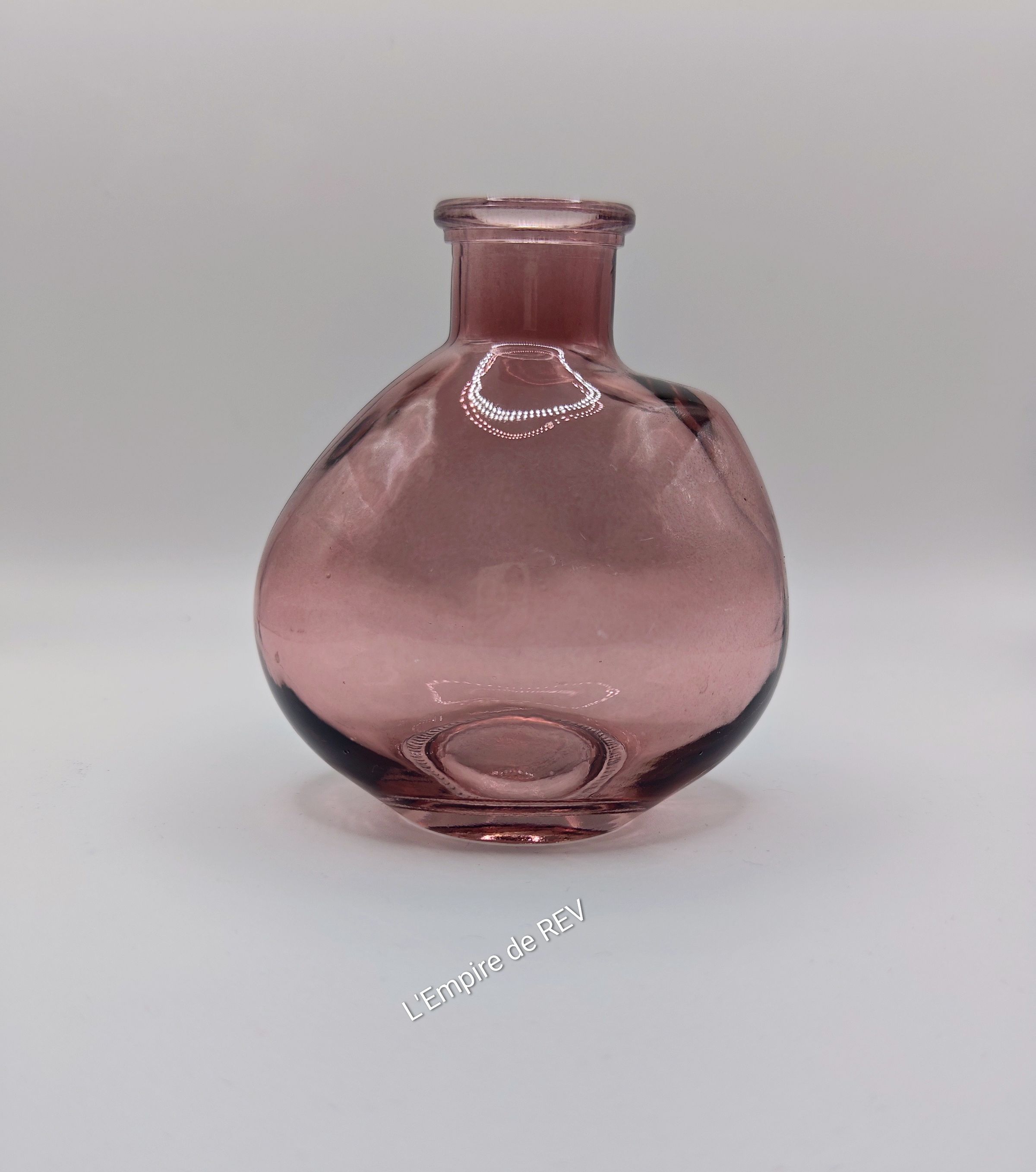 Bouteille en verre pour fleurs en cire