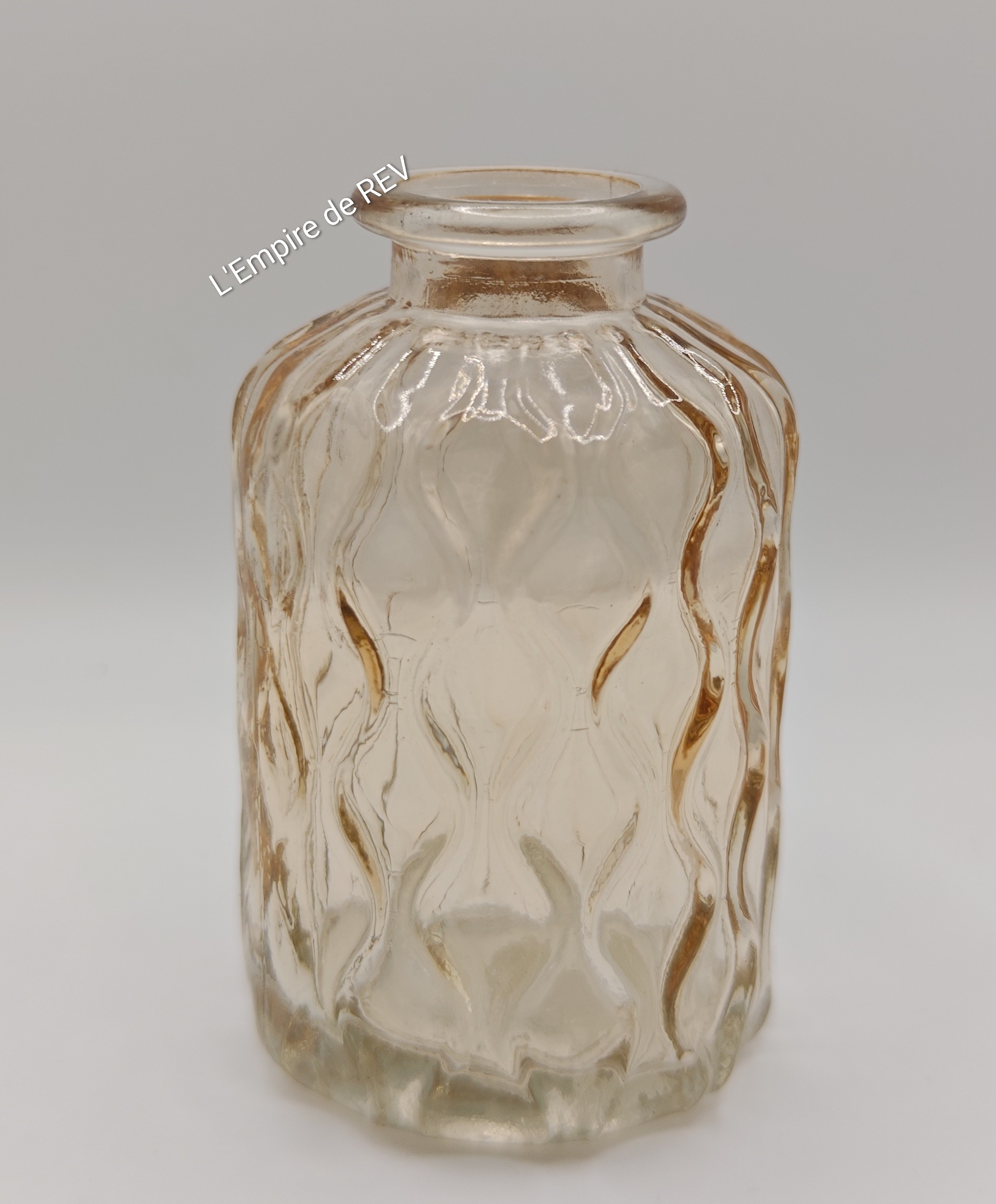 Bouteille en verre pour bouquet de fleurs en bougie