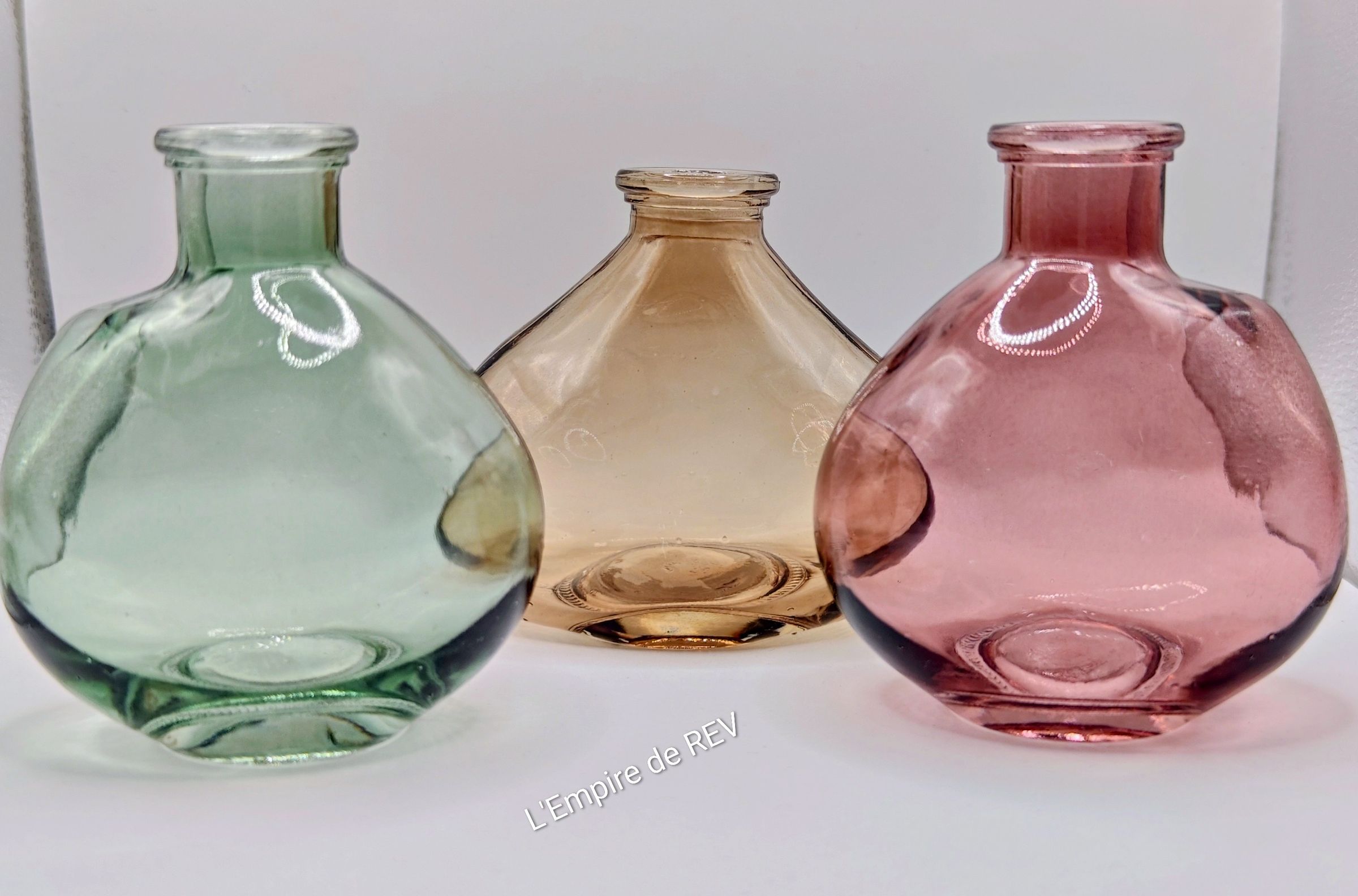 Bouteille en verre pour fleurs en cire