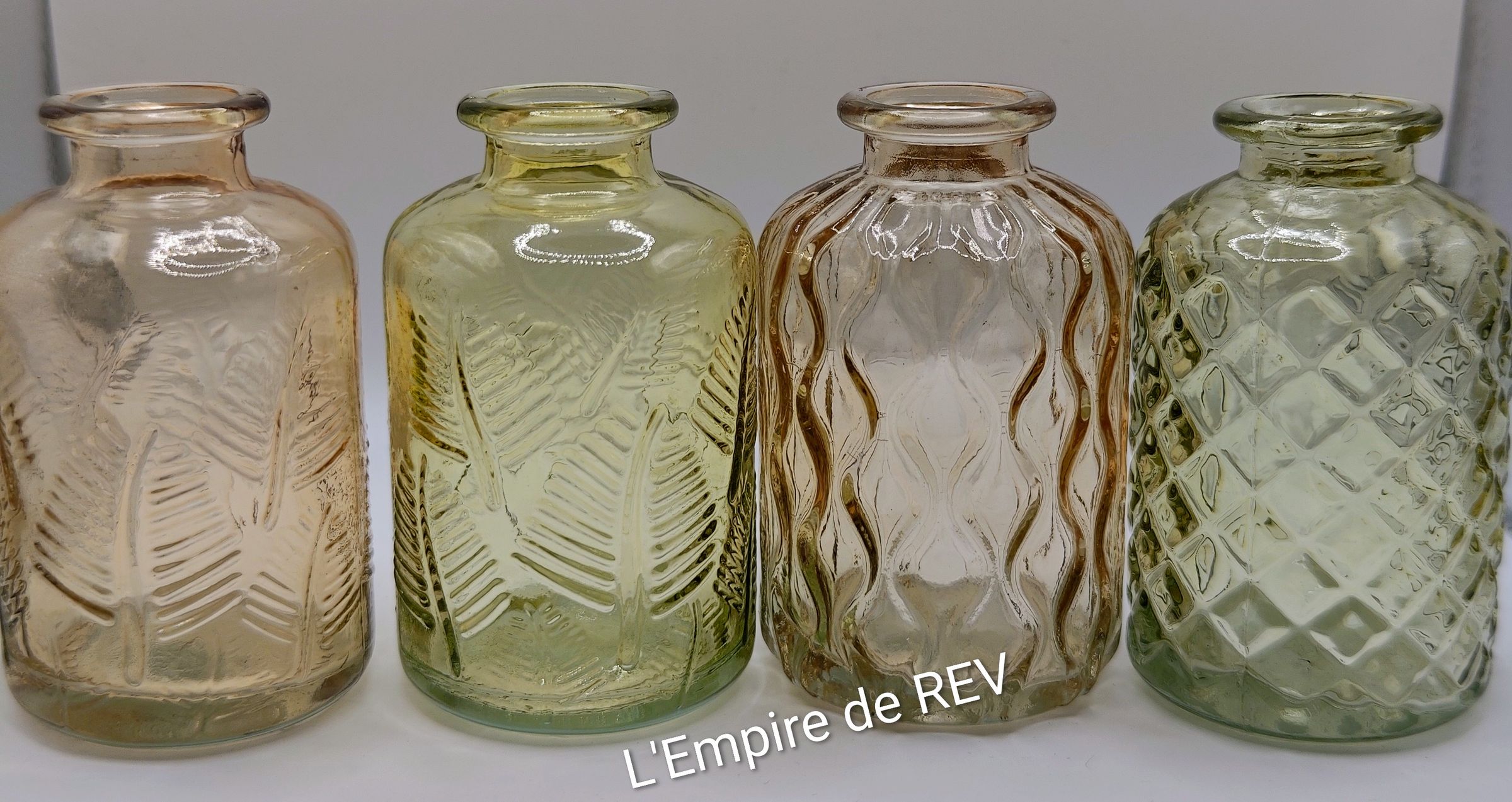 Bouteille en verre pour bouquet de fleurs en bougie