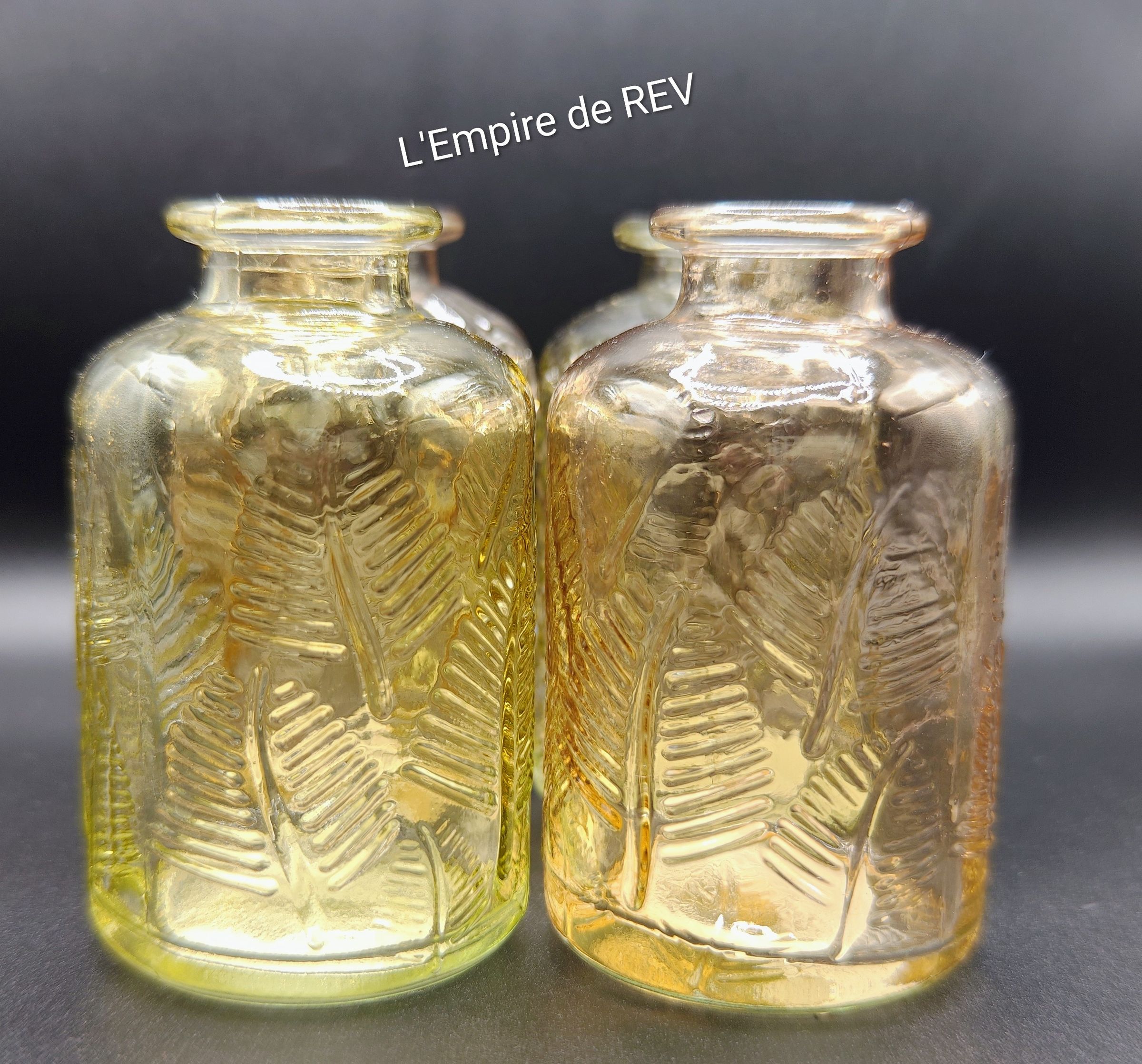 Bouteille en verre pour bouquet de fleurs en bougie