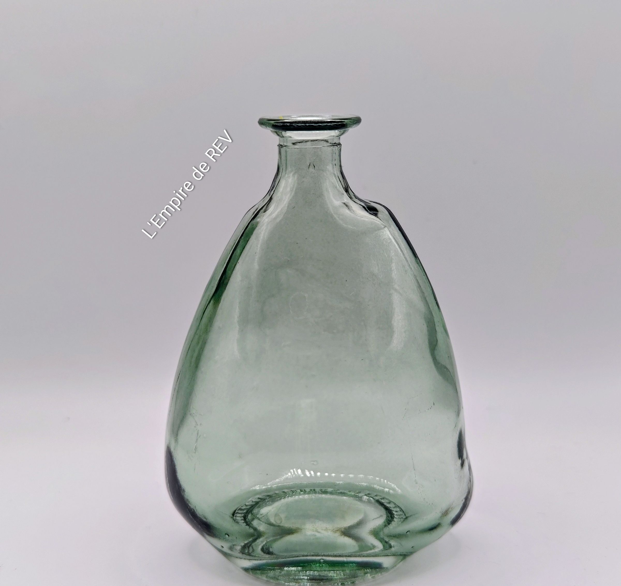 Bouteille en verre pour fleurs en cire